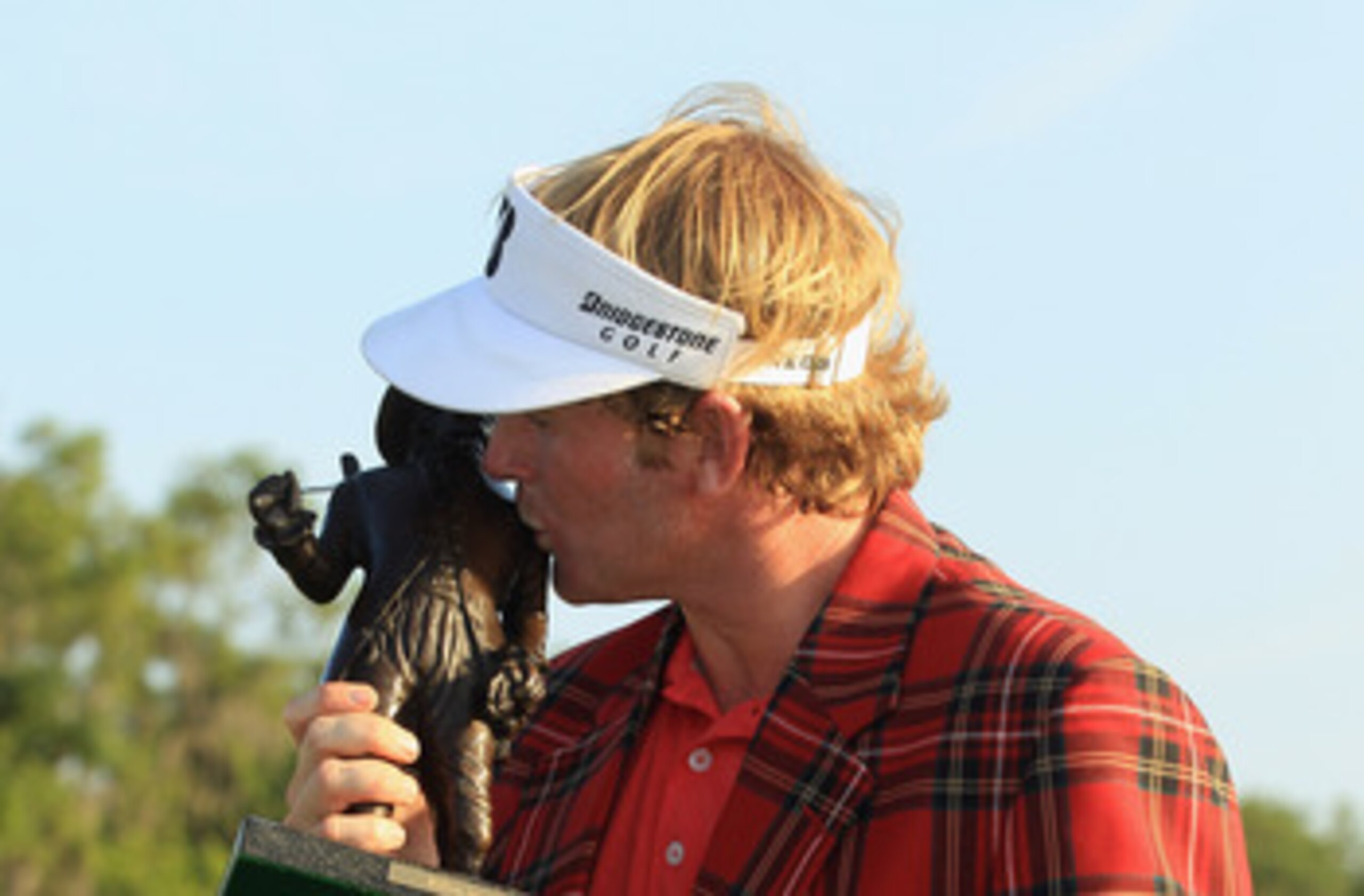 HILTON HEAD ISLAND, SC - APRIL 24:  Brandt Snedeker poses with the trophy after defeating Luke Donald in a playoff during the final round of The Heritage at Harbour Town Golf Links on April 24, 2011 in Hilton Head Island, South Carolina.  (Photo by Street