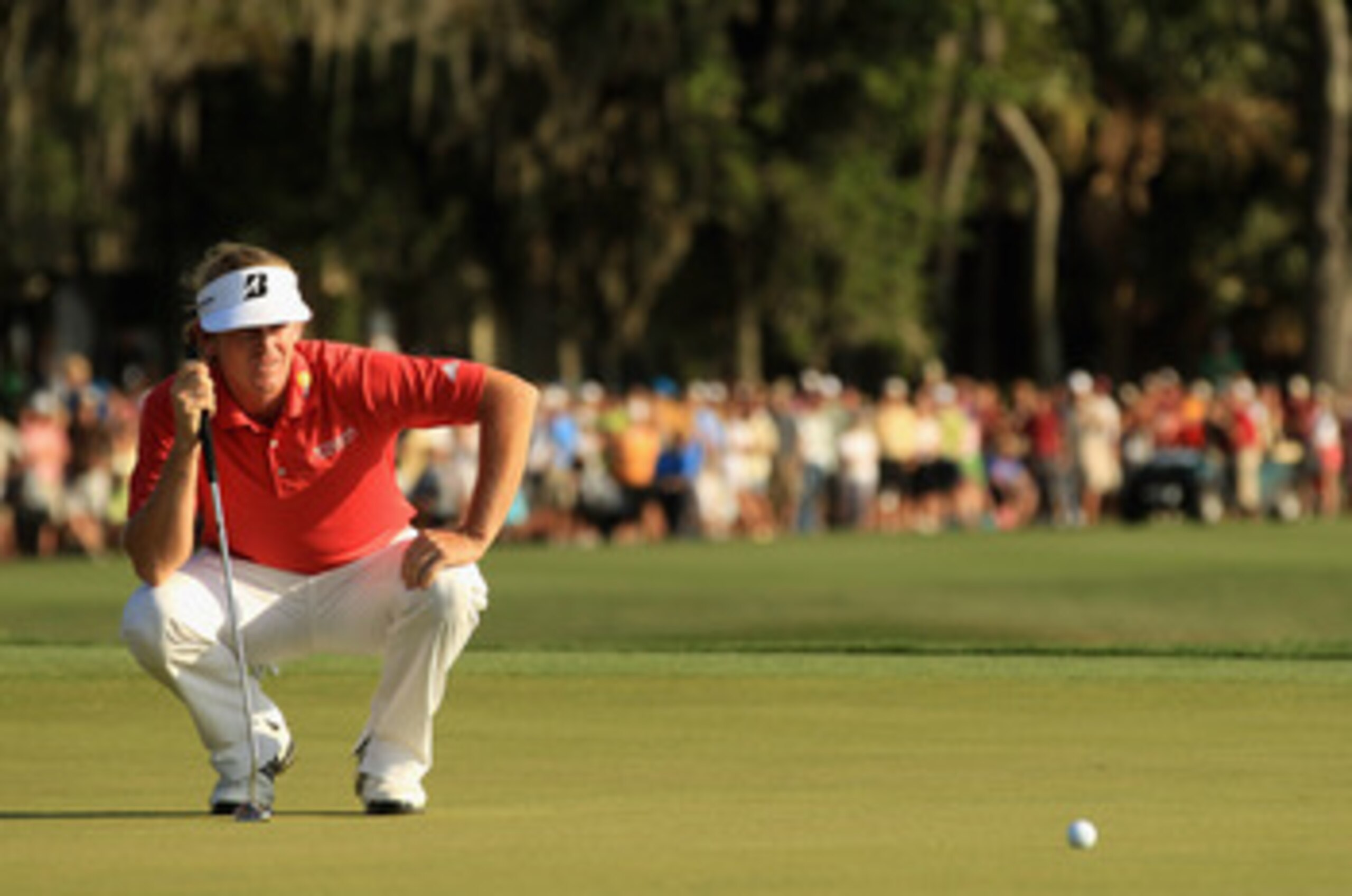 HILTON HEAD ISLAND, SC - APRIL 24:  Brandt Snedeker lines up a putt on the 18th hole during the final round of The Heritage at Harbour Town Golf Links on April 24, 2011 in Hilton Head Island, South Carolina.  (Photo by Streeter Lecka/Getty Images)