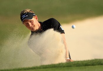 HILTON HEAD ISLAND, SC - APRIL 24:  Luke Donald of England hits a shot from the sand on the 18th hole during the final round of The Heritage at Harbour Town Golf Links on April 24, 2011 in Hilton Head Island, South Carolina.  (Photo by Streeter Lecka/Gett
