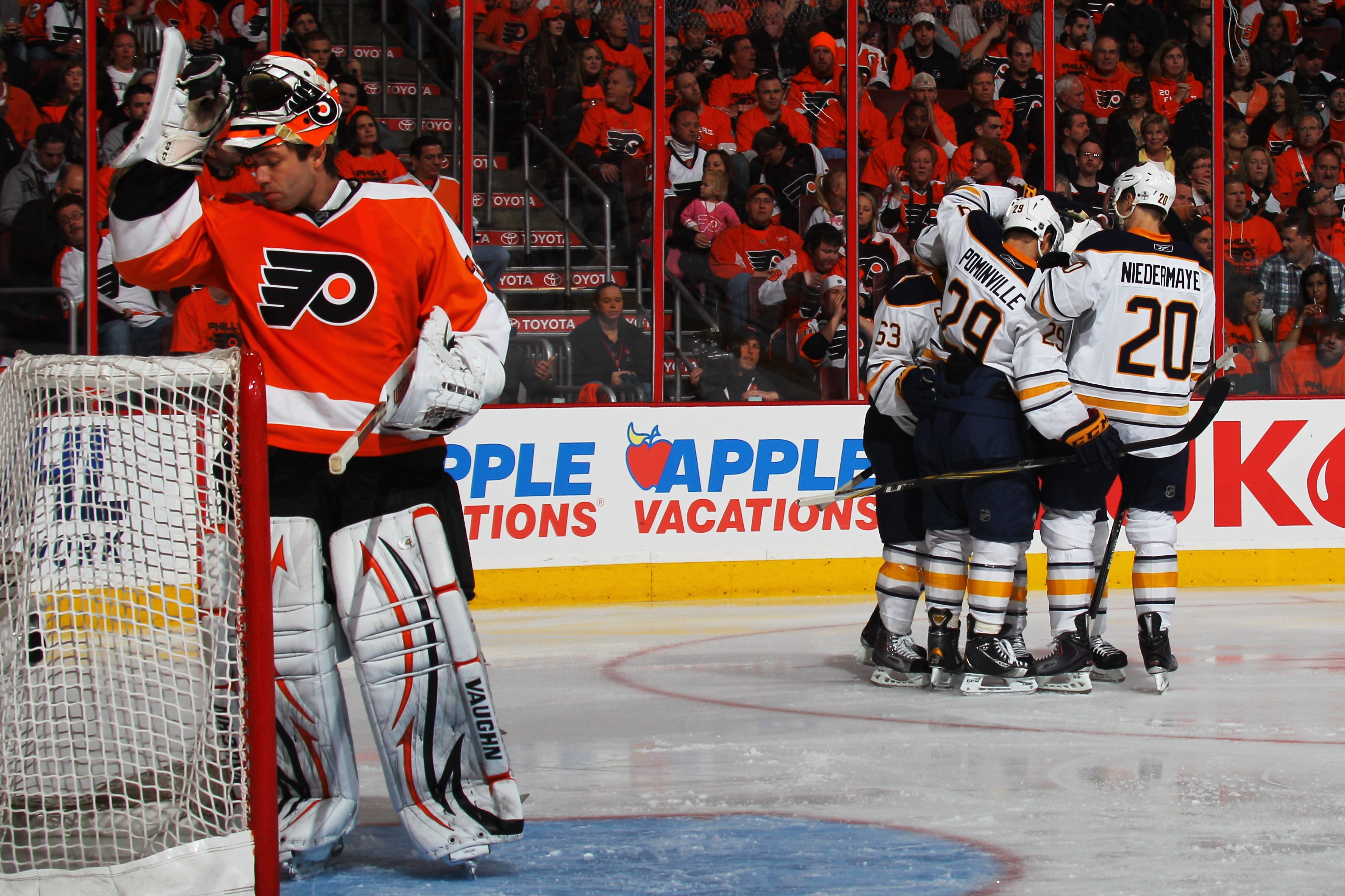 PHILADELPHIA, PA - APRIL 22:  Tyler Ennis #63 celebrates with Jason Pominville #29 and Rob Niedermayer #20 of the Buffalo Sabres after scoring a first period goal against Brian Boucher #33 of the Philadelphia Flyers in Game Five of the Eastern Conference