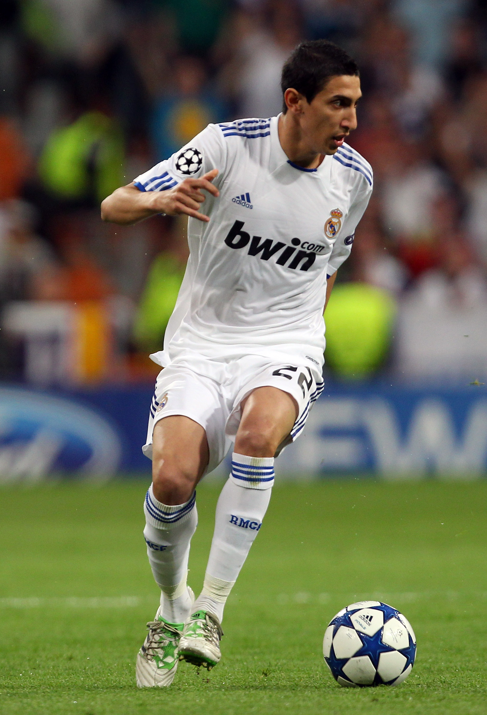 MADRID, SPAIN - APRIL 05:  Angel Di Maria of Real Madrid during the UEFA Champions League Quarter Final first leg match between Real Madrid and Tottenham Hotspur at Estadio Santiago Bernabeu on April 5, 2011 in Madrid, Spain.  (Photo by Clive Rose/Getty I