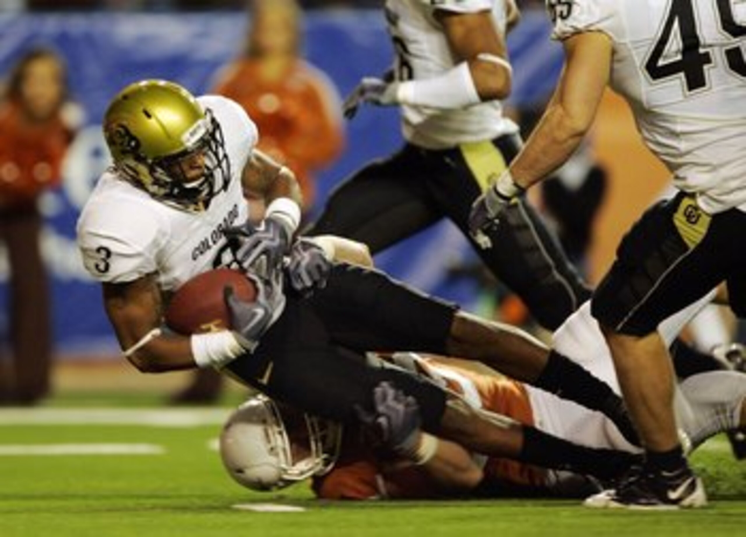 AUSTIN, TX - OCTOBER 10:  Cornerback Jimmy Smith #3 of the Colorado Buffaloes picks up the loose ball which was knocked out of the hand of quarterback Colt McCoy of the Texas Longhorns in the second quarter  on October 10, 2009 at Darrell K Royal-Texas Me