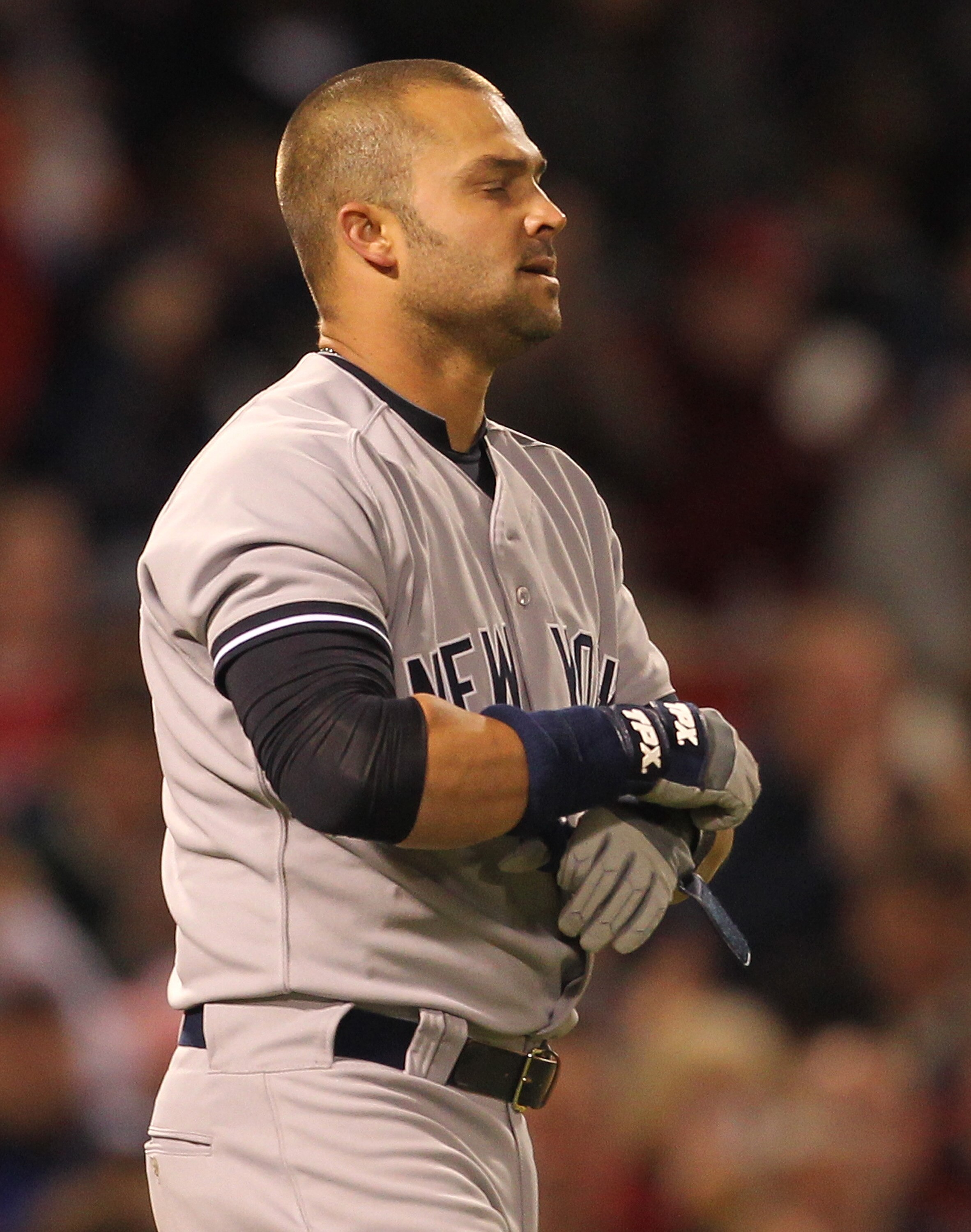 BOSTON, MA - APRIL 10: Nick Swisher #33 of the New York Yankees reacts after striking out against the Boston Red Sox at Fenway Park April 10, 2011 in Boston, Massachusetts. (Photo by Jim Rogash/Getty Images)