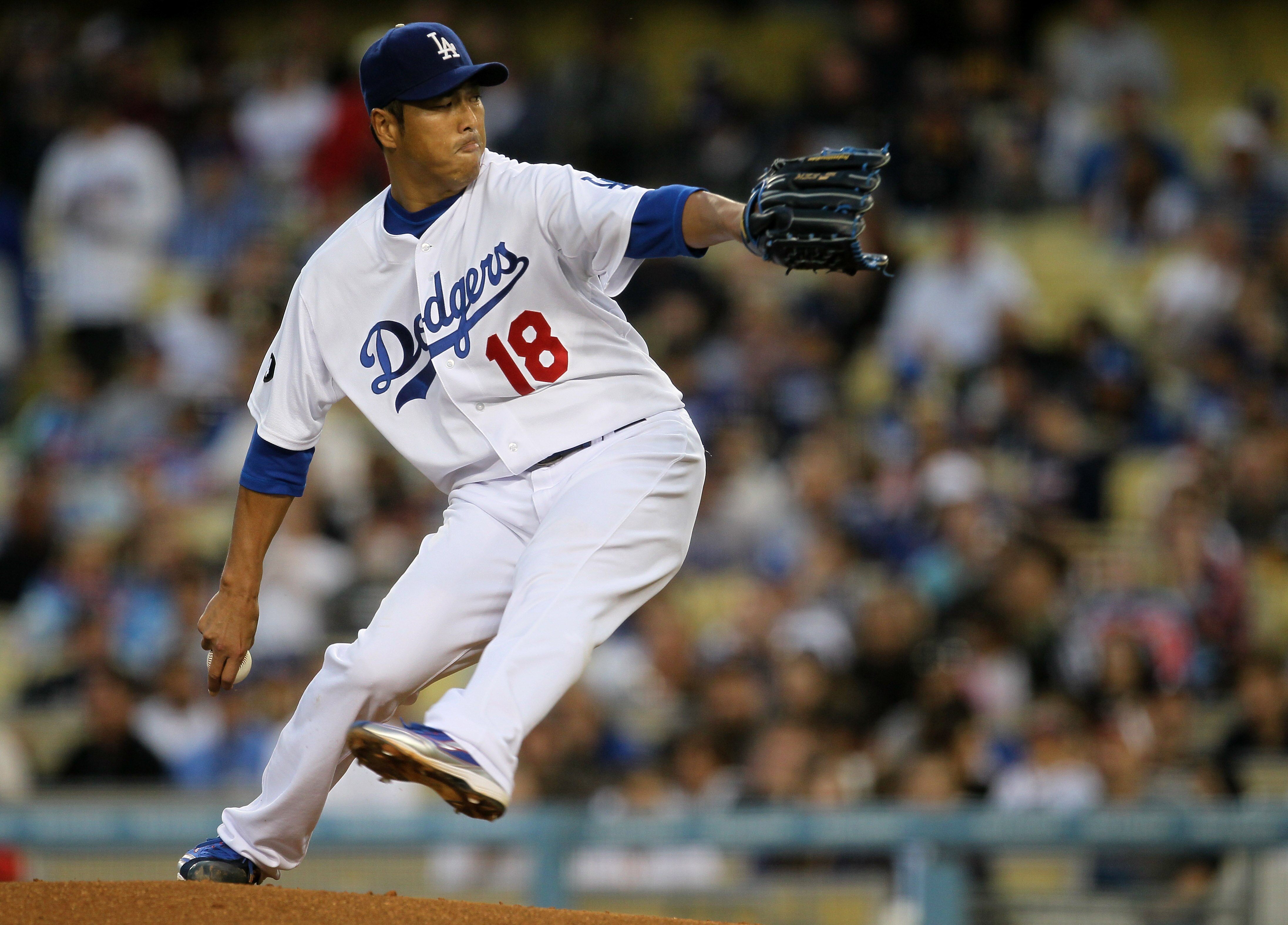LOS ANGELES, CA - APRIL 19:  Hiroki Kuroda #18 of the Los Angeles Dodgers throws a pitch against the Atlanta Braves on April 19, 2011 at Dodger Stadium in Los Angeles, California.  (Photo by Stephen Dunn/Getty Images)