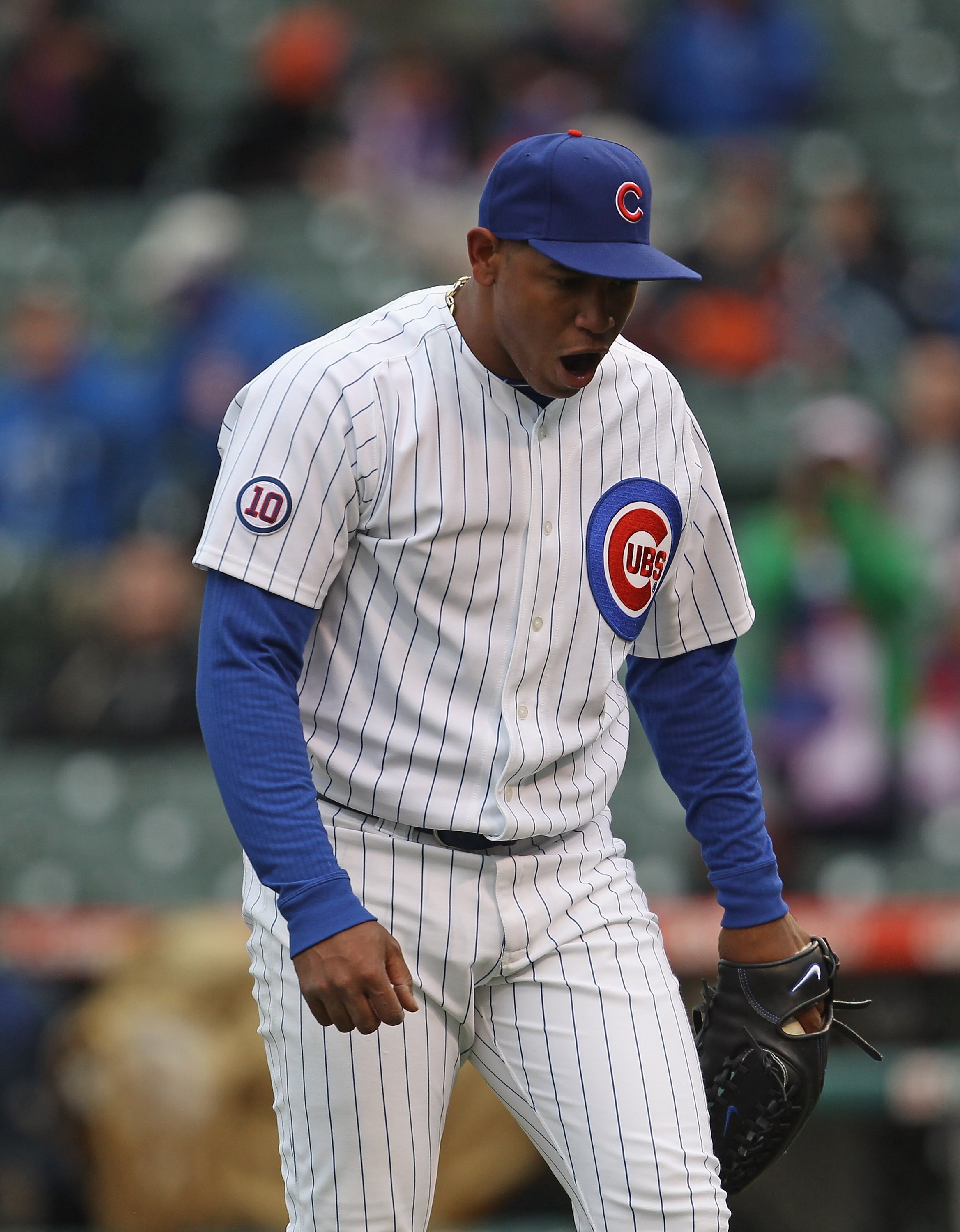 CHICAGO, IL - APRIL 20: Carlos Marmol #49 of the Chicago Cubs talks to himself as he leaves the field in the 9th inning after giving up the tying run to the San Diego Padres at Wrigley Field on April 20, 2011 in Chicago, Illinois. The Cubs defeated the Pa