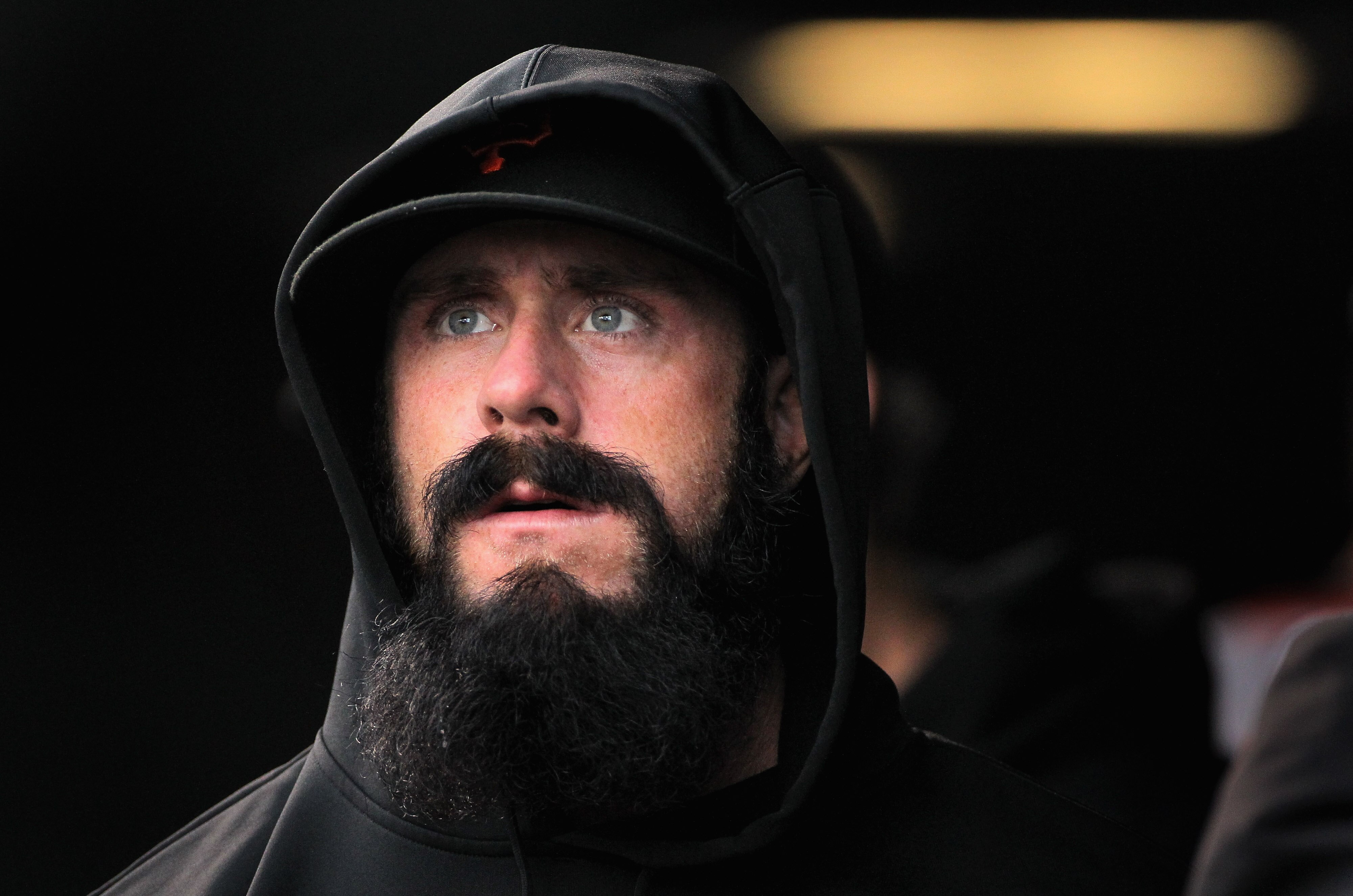 DENVER, CO - APRIL 19:  Brian Wilson #38 of the San Francisco Giants looks on during batting practice prior to facing the Colorado Rockies at Coors Field on April 19, 2011 in Denver, Colorado.  (Photo by Doug Pensinger/Getty Images)