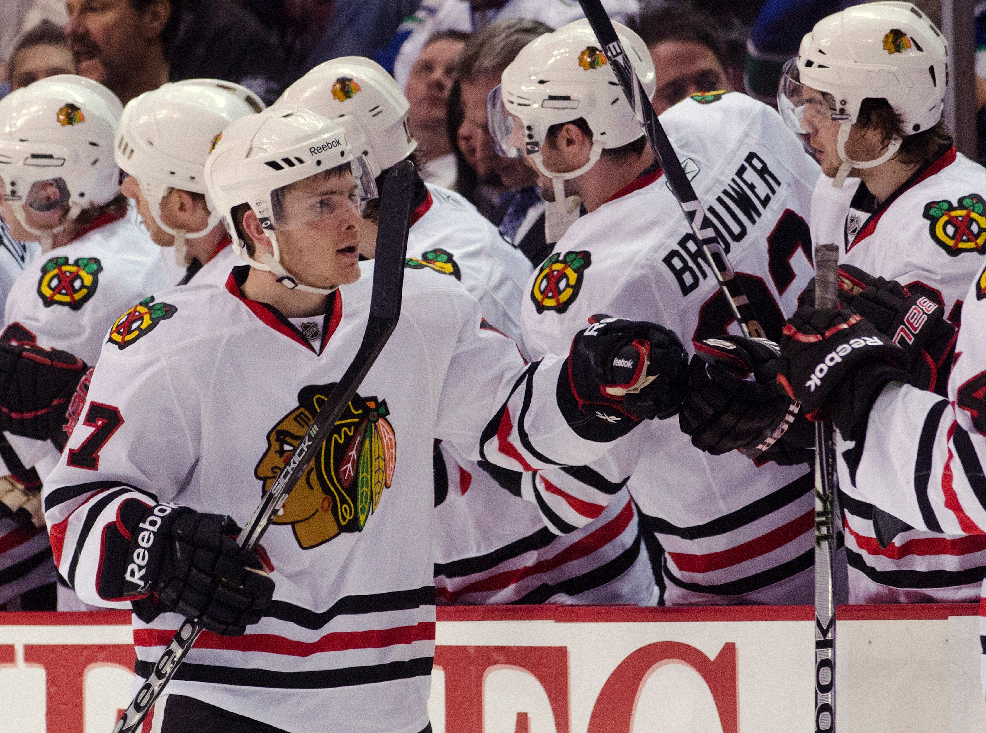 VANCOUVER, CANADA - APRIL 15: Ben Smith #57 of the Chicago Blackhawks celebrates after scoring against the Vancouver Canucks during the second period in Game Two of the Western Conference Quarterfinals during the 2011 NHL Stanley Cup Playoffs on April 15,