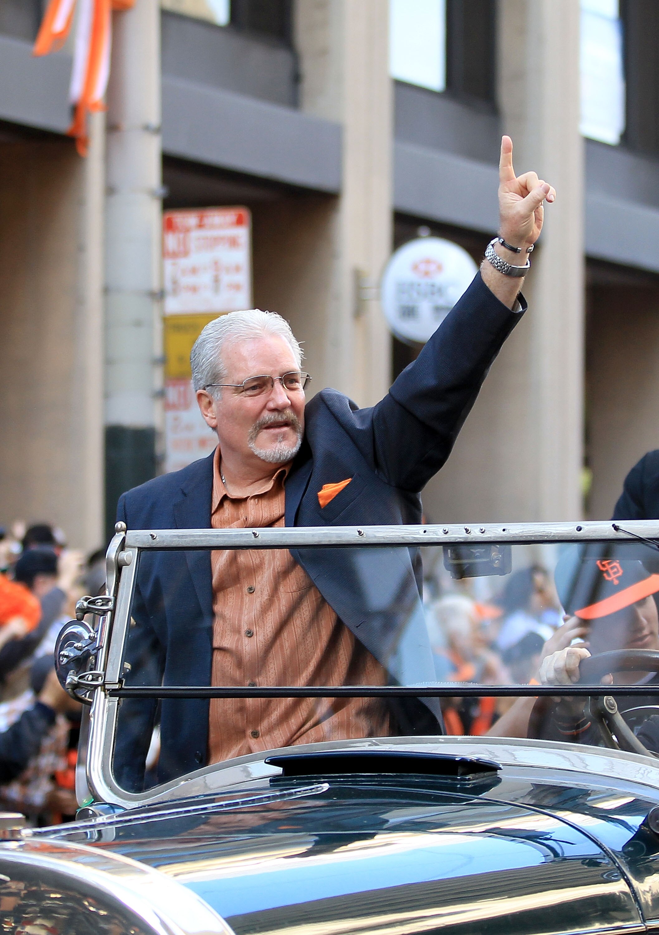 SAN FRANCISCO - NOVEMBER 03:  General Manager Brian Sabean of the San Francisco Giants waves to the crowd during the San Francisco Giants victory parade on November 3, 2010 in San Francisco, California.  (Photo by Ezra Shaw/Getty Images)
