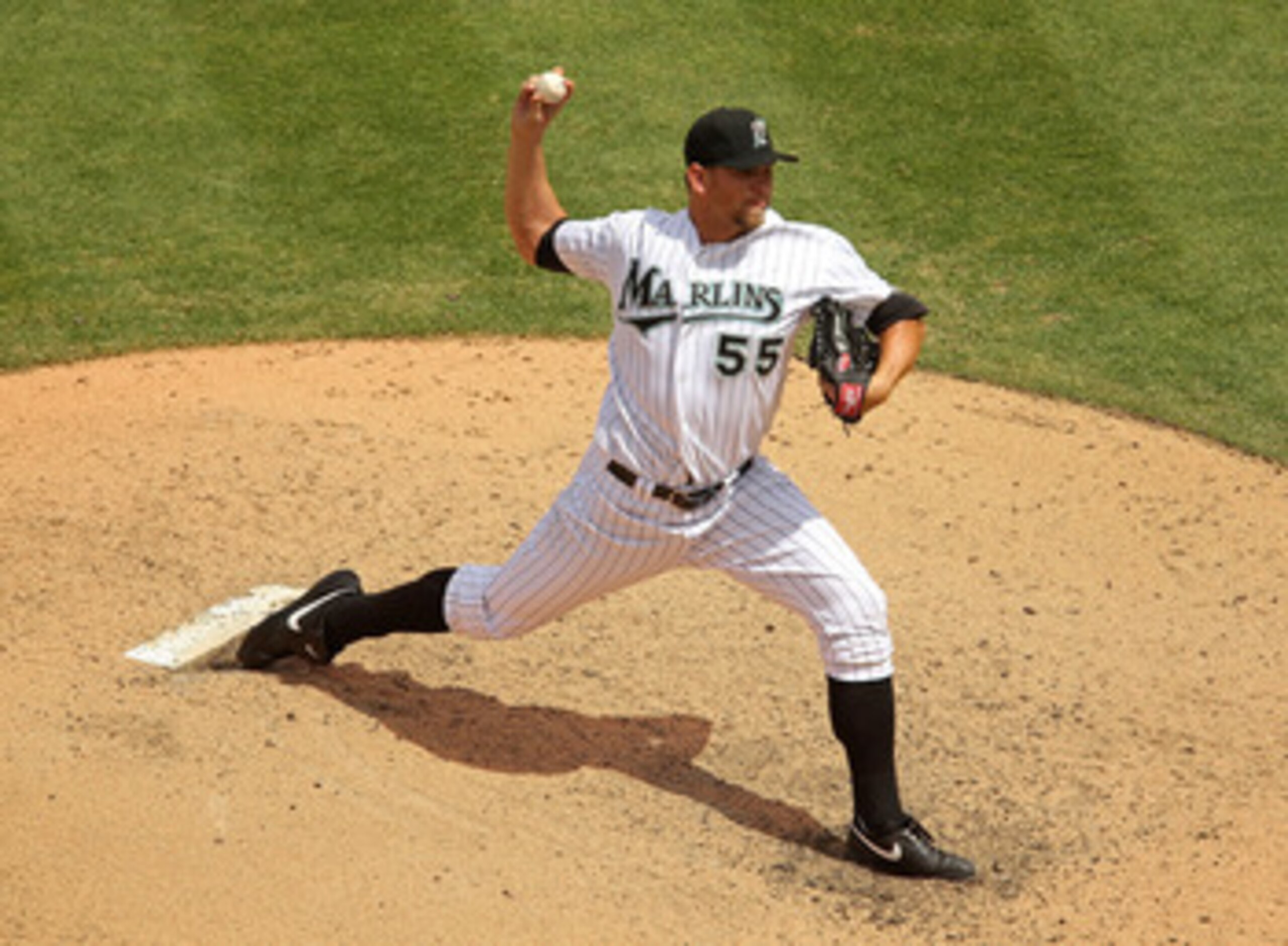 MIAMI GARDENS, FL - APRIL 24: Josh Johnson #55 of the Florida Marlins pitches during a game against the Colorado Rockies at Sun Life Stadium on April 24, 2011 in Miami Gardens, Florida. (Photo by Mike Ehrmann/Getty Images) MIAMI GARDENS, FL - APRIL 24: Josh Johnson #55 of the Florida Marlins pitches during a game against the Colorado Rockies at Sun Life Stadium on April 24, 2011 in Miami Gardens, Florida. (Photo by Mike Ehrmann/Getty Images)