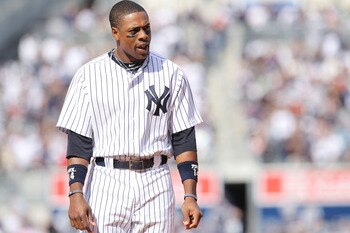 NEW YORK, NY - APRIL 03:  Curtis Granderson #14 of the New York Yankees against the Detroit Tigers at Yankee Stadium on April 3, 2011 in the Bronx borough of New York City.  (Photo by Nick Laham/Getty Images)
