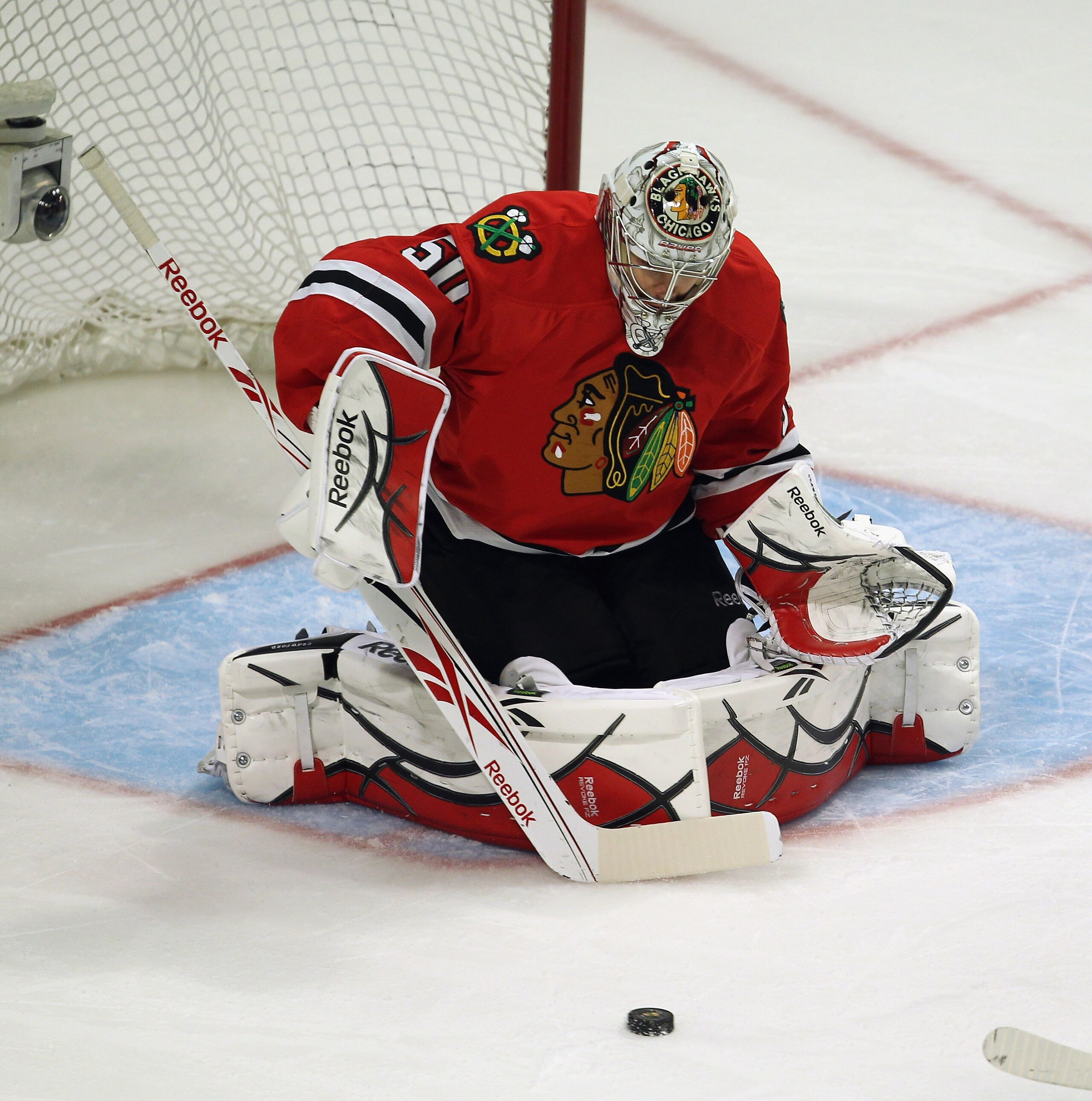 CHICAGO, IL - APRIL 24: Corey Crawford #50 of the Chicago Blackhawks makes a save against the Vancouver Canucks in Game Six of the Western Conference Quarterfinals during the 2011 NHL Stanley Cup Playoffs at the United Center on April 24, 2011 in Chicago,
