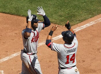 SAN FRANCISCO, CA - APRIL 24:  Jason Heyward #22 of the Atlanta Braves is congratulated by Martin Prado #14 after he hit a home run against the San Francisco Giants in the seventh inning at AT&T Park on April 24, 2011 in San Francisco, California.  (Photo