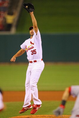 ST. LOUIS, MO - APRIL 24: Starter Jake Westbrook #35 of the St. Louis Cardinals fields a one hopper against the Cincinnati Reds at Busch Stadium on April 24, 2011 in St. Louis, Missouri.  (Photo by Dilip Vishwanat/Getty Images)