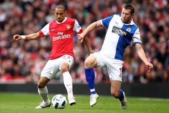 LONDON, ENGLAND - APRIL 02:  Brett Emerton of Blackburn challenges Gael Clichy of Arsenal during the Barclays Premier League match between Arsenal and Blackburn Rovers at the Emirates Stadium on April 2, 2011 in London, England.  (Photo by Julian Finney/G