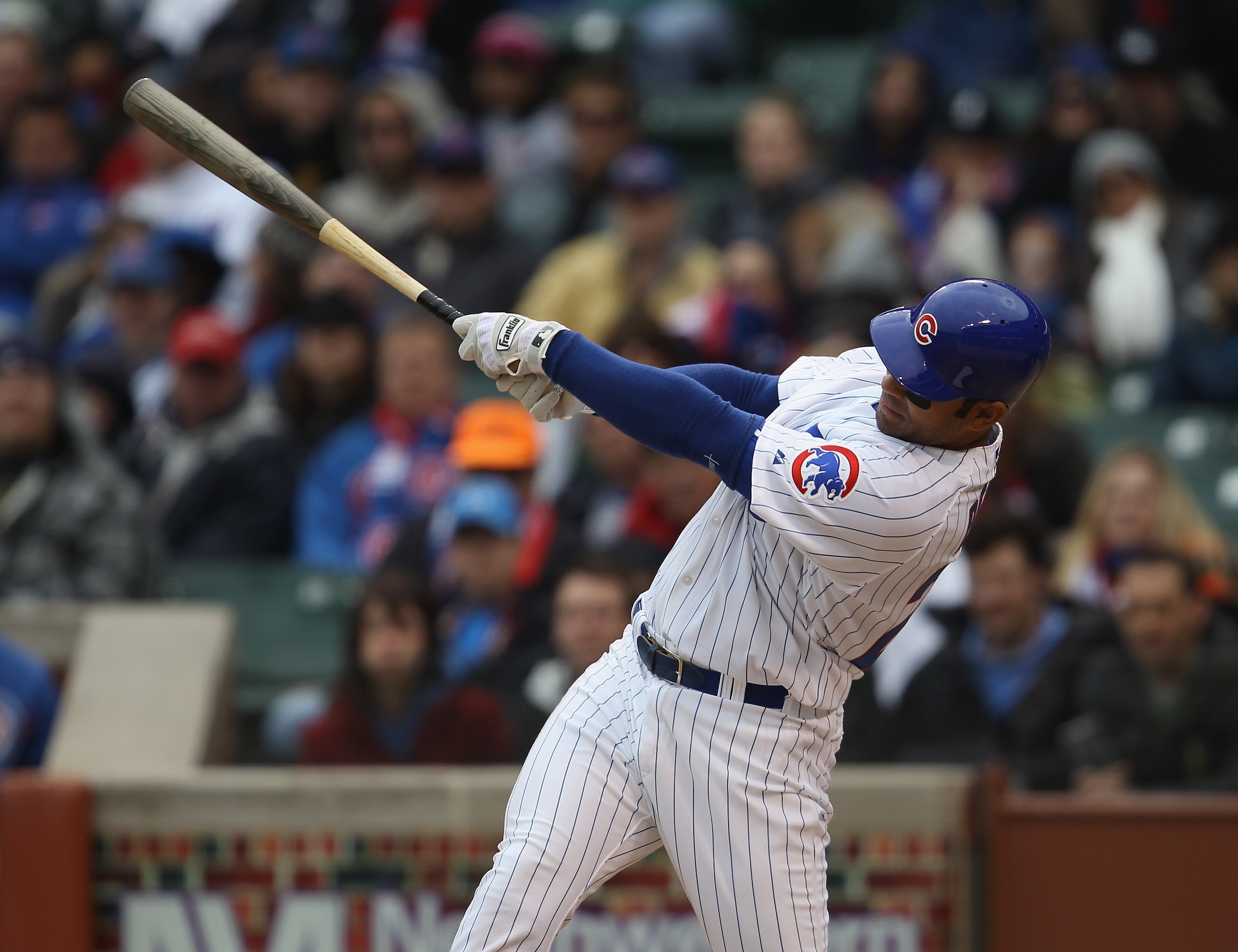 CHICAGO, IL - APRIL 20: Carlos Pena #22 of the Chicago Cubs takes a swing against the San Diego Padres at Wrigley Field on April 20, 2011 in Chicago, Illinois. The Cubs defeated the Padres 2-1 in 11 innings. (Photo by Jonathan Daniel/Getty Images)