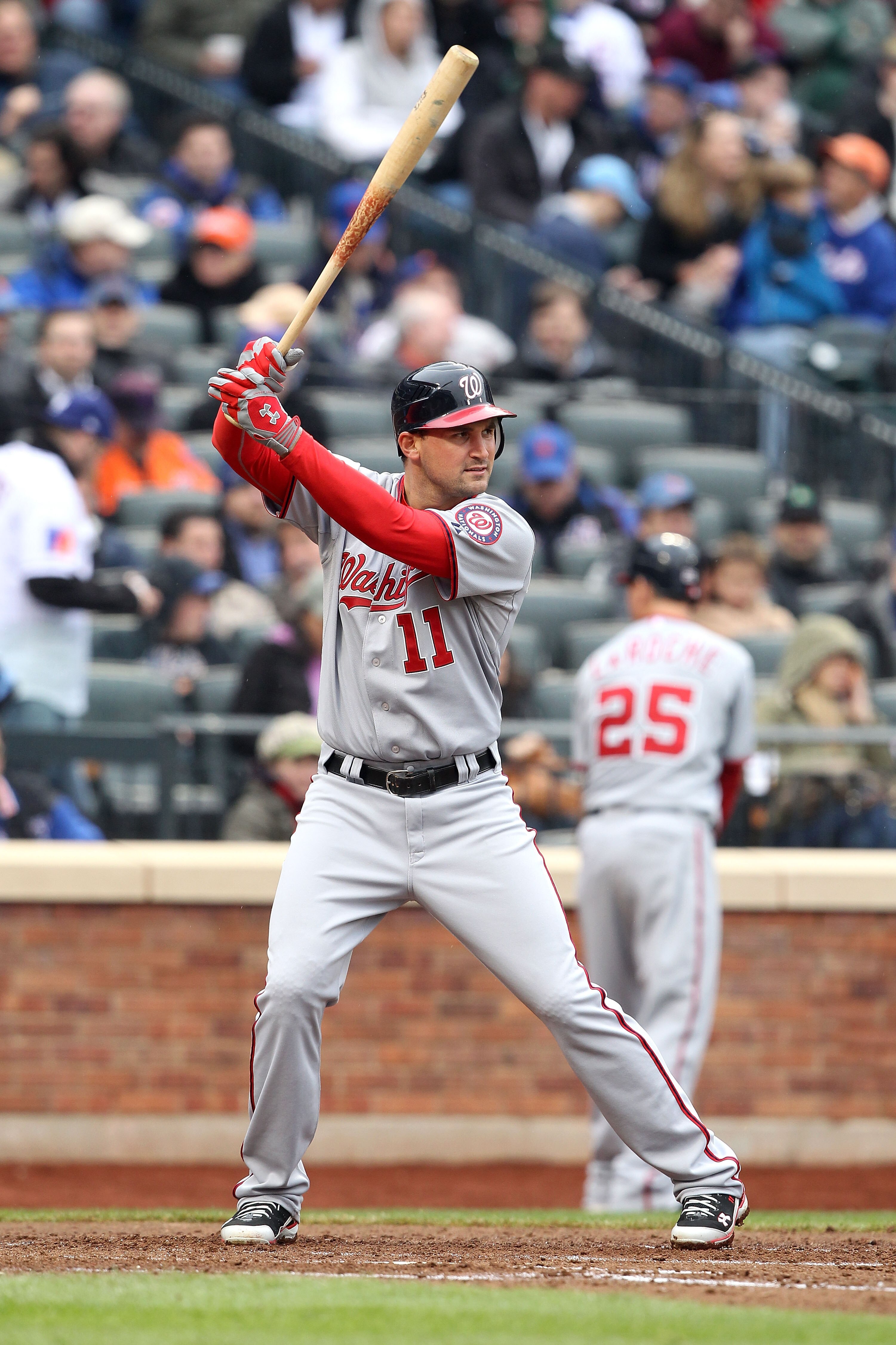 NEW YORK, NY - APRIL 08:  Ryan Zimmerman #11 of the Washington Nationals bats against the New York Mets during the Mets' Home Opener at Citi Field on April 8, 2011 in the Flushing neighborhood of Queens in New York City. The Nationals won 6-2.  (Photo by