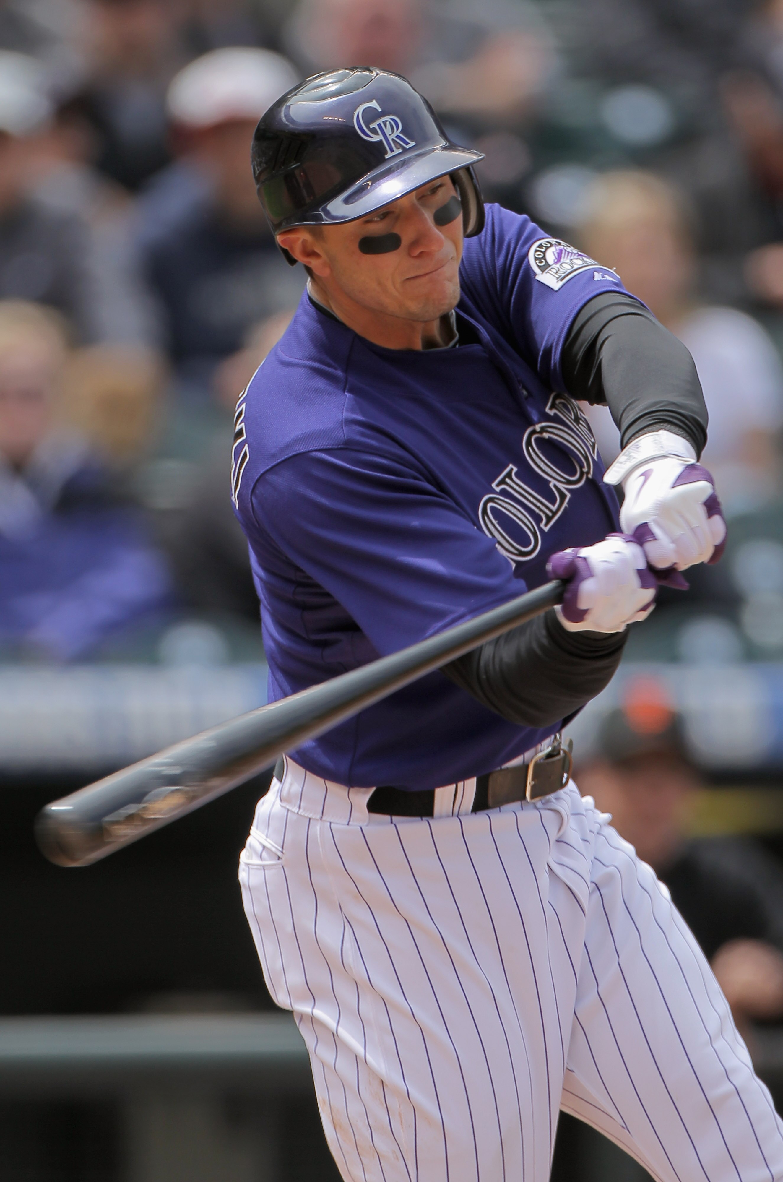 DENVER, CO - APRIL 20:  Troy Tulowitzki #2 of the Colorado Rockies hits a double in the second inning against the San Francisco Giants at Coors Field on April 20, 2011 in Denver, Colorado.  (Photo by Doug Pensinger/Getty Images)