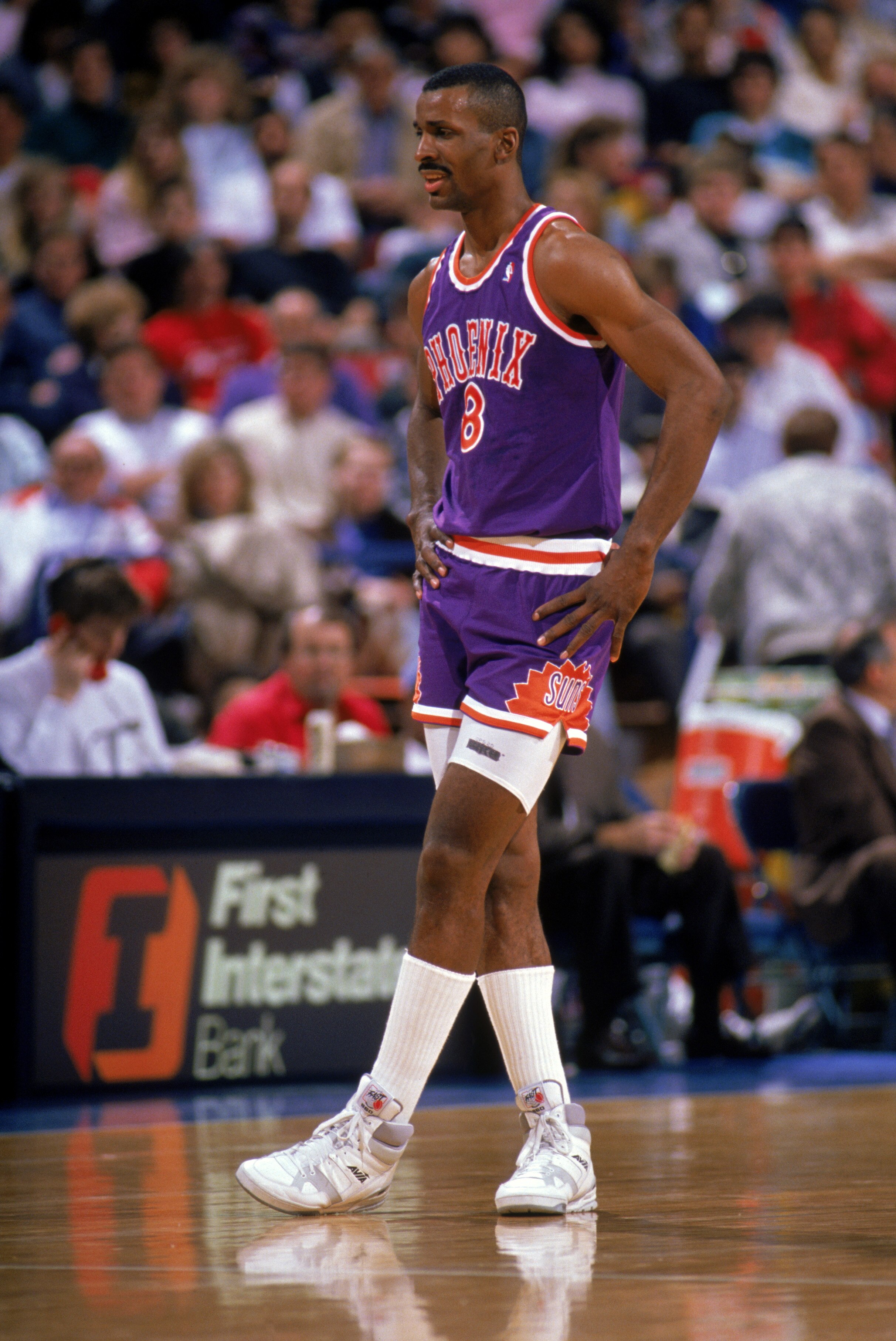 PHOENIX - 1989:  Eddie Johnson #8 of the Phoenix Suns looks on during a 1989 season NBA game at Veteran's Memorial Coliseum in Phoenix, Arizona.  (Photo by Otto Greule Jr./Getty Images)