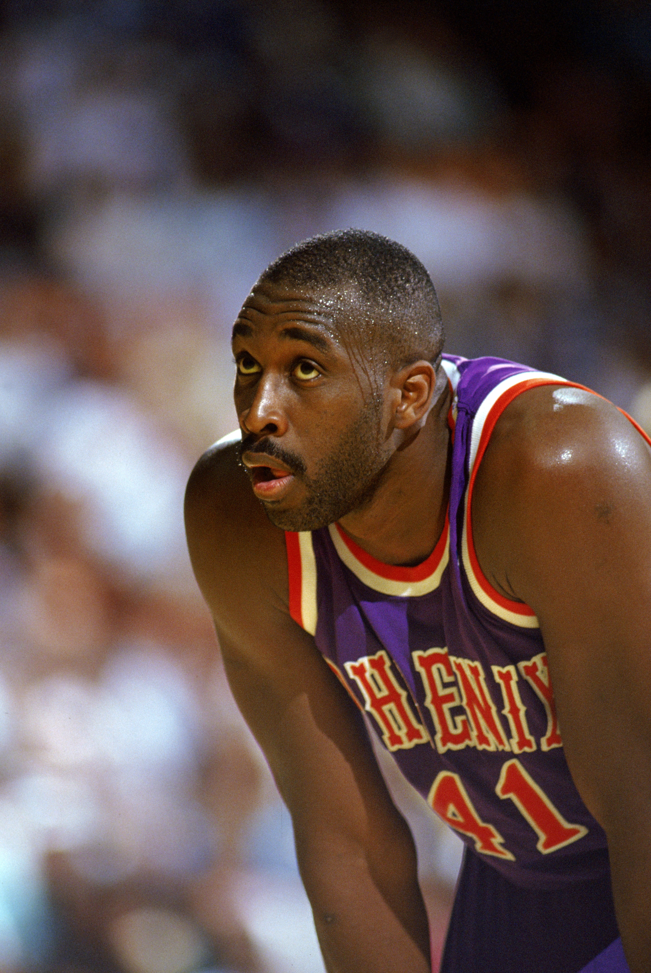 INGLEWOOD, CA - 1988:  Mark West #41 of the Phoenix Suns looks on against the Los Angeles Lakers during the game at the Great Western Forum in Inglewood, California. (Photo by Ken Levine/Getty Images)