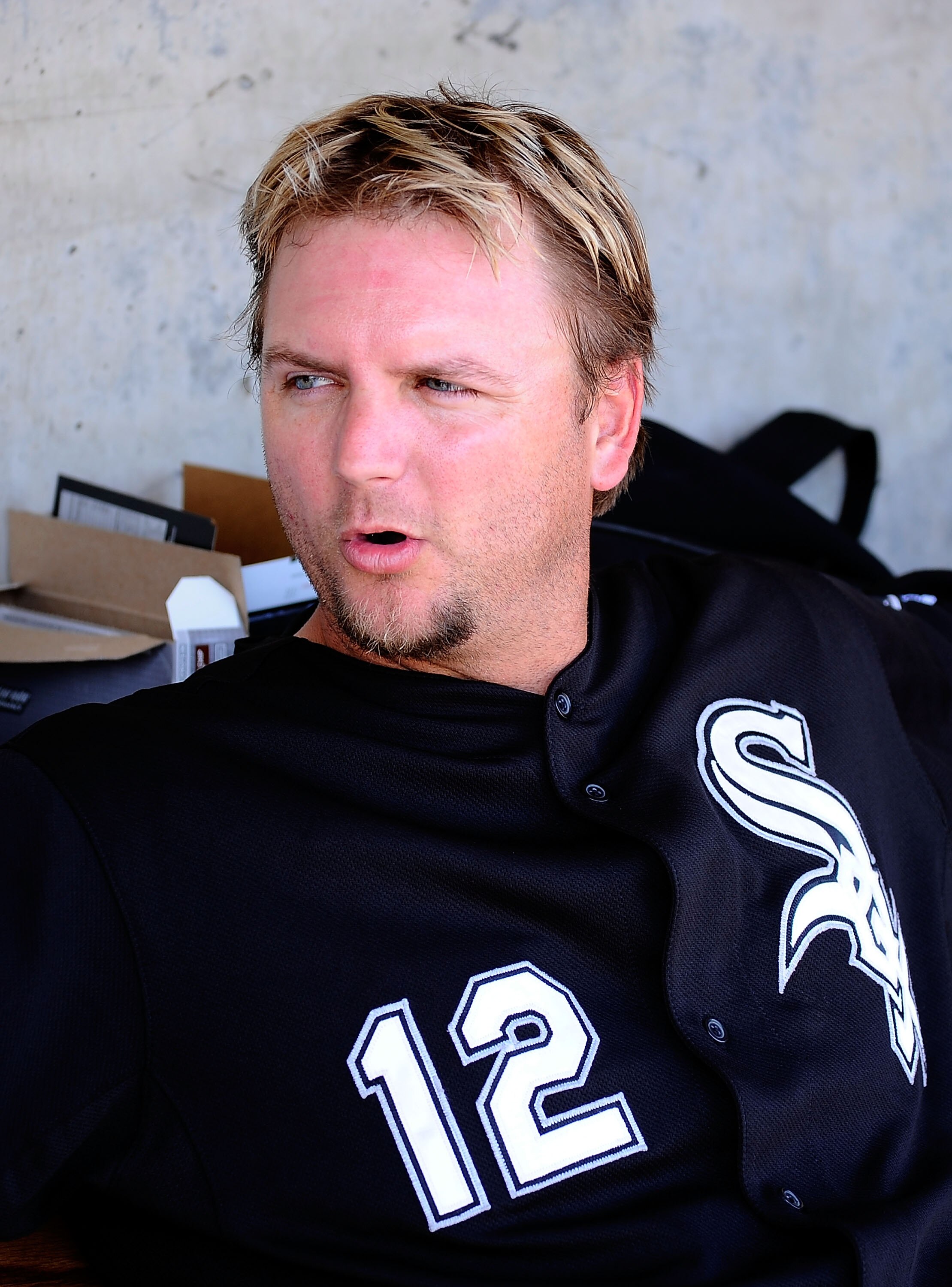 PHOENIX, AZ - MARCH 17:  A.J. Pierzynski #12 of the Chicago White Sox sits in the dug out against the Milwaukee Brewers during the spring training game at Maryvale Baseball Park on March 17, 2011 in Phoenix, Arizona.  (Photo by Kevork Djansezian/Getty Ima