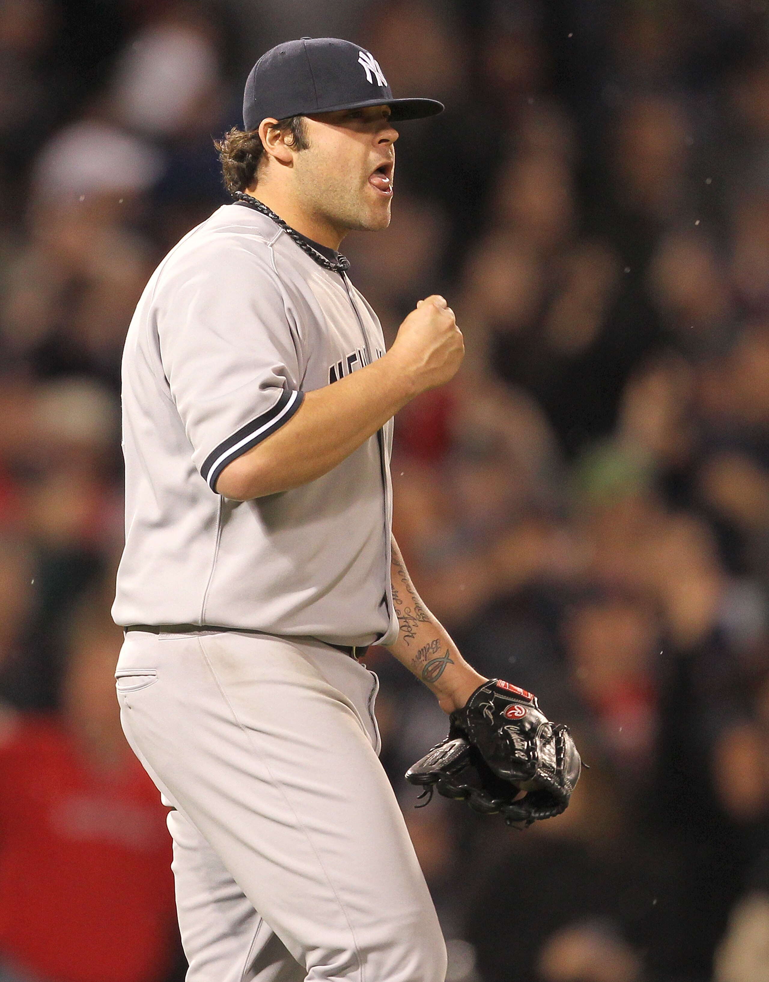 BOSTON, MA - APRIL 10: Joba Chamberlain #62 of the New York Yankees reacts after giving up two runs against the Boston Red Sox at Fenway Park April 10, 2011 in Boston, Massachusetts. (Photo by Jim Rogash/Getty Images) BOSTON, MA - APRIL 10: Joba Chamberlain #62 of the New York Yankees reacts after giving up two runs against the Boston Red Sox at Fenway Park April 10, 2011 in Boston, Massachusetts. (Photo by Jim Rogash/Getty Images)