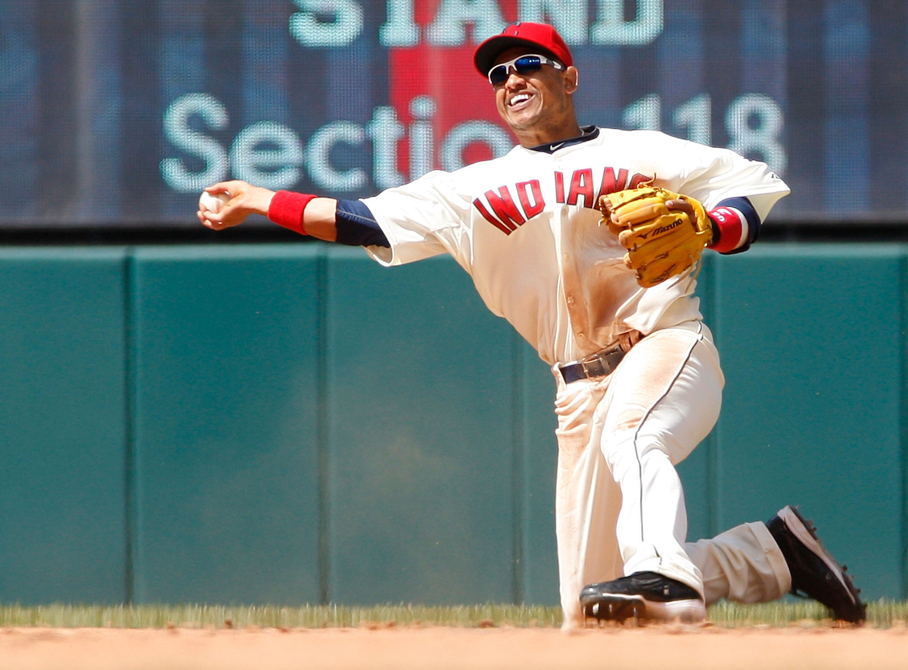 CLEVELAND - APRIL 17:  Orlando Cabrera #20 of the Cleveland Indians fields a ground ball against the Baltimore Orioles during the game on April 17, 2011 at Progressive Field in Cleveland, Ohio.  (Photo by Jared Wickerham/Getty Images)