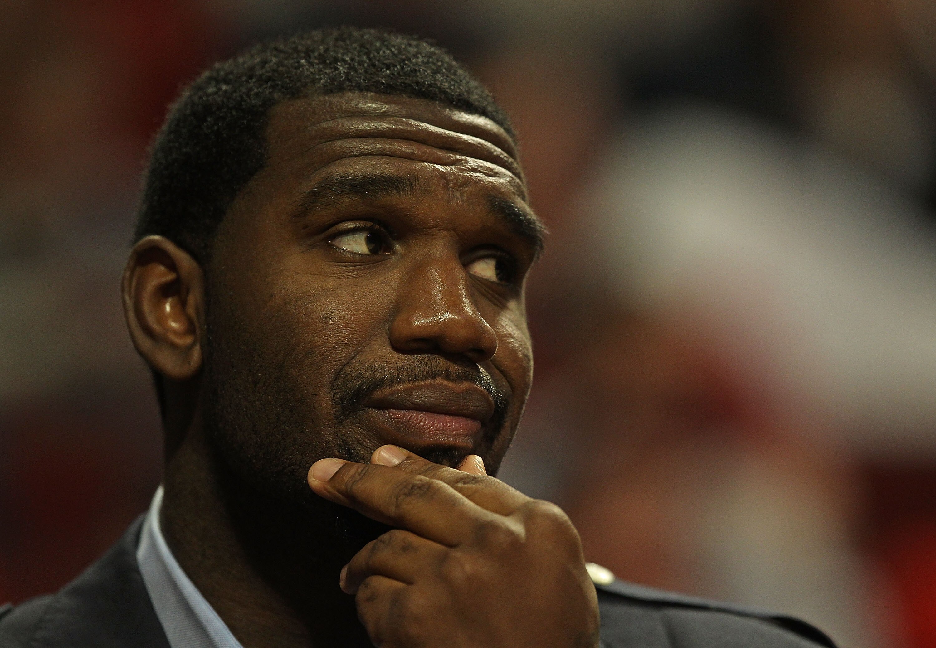 CHICAGO - NOVEMBER 01: Greg Oden #52 of the Portland Trail Blazers watches from the bench as his teammates take on the Chicago Bulls at the United Center on November 1, 2010 in Chicago, Illinois. The Bulls defeated the Trail Blazers 110-98. NOTE TO USER: