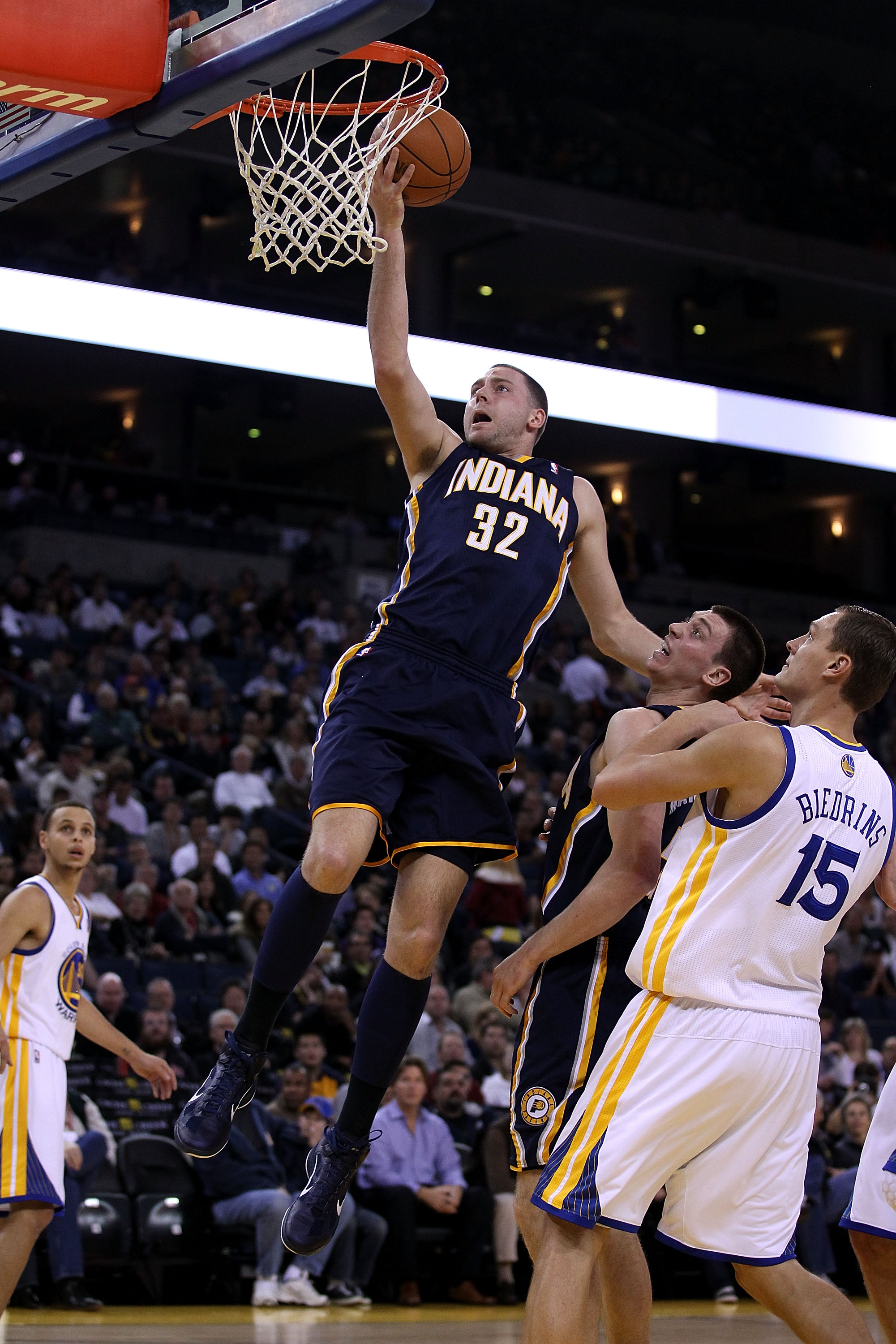 OAKLAND, CA - JANUARY 19: Josh McRoberts #32 of the Indiana Pacers goes up for a shot against the Golden State Warriors at Oracle Arena on January 19, 2011 in Oakland, California.  NOTE TO USER: User expressly acknowledges and agrees that, by downloading