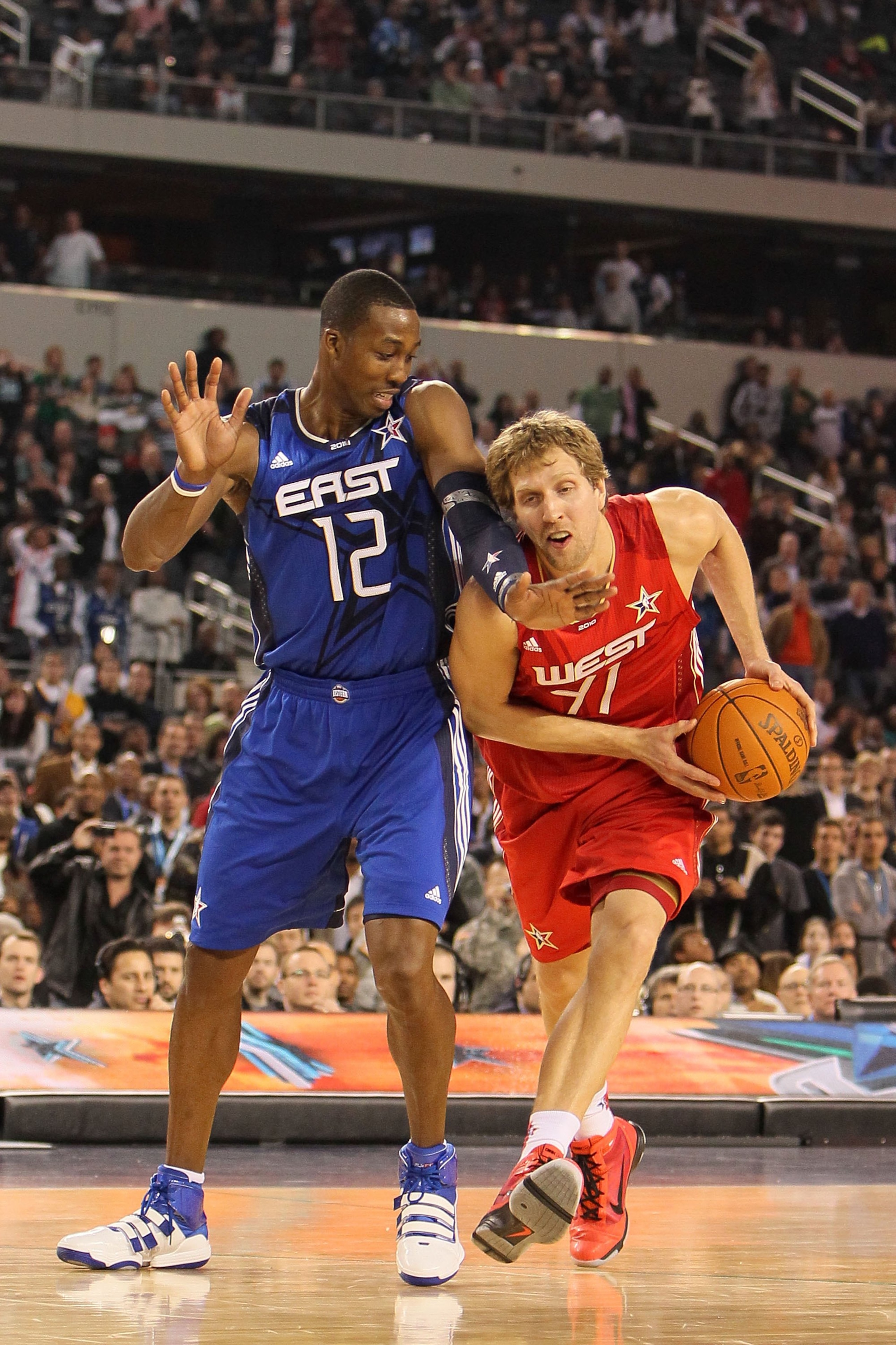 ARLINGTON, TX - FEBRUARY 14:  Dirk Notwitzki #41 of the Western Conference drives against Dwight Howard #12 of the Eastern Conference during the second half of the NBA All-Star Game, part of 2010 NBA All-Star Weekend at Cowboys Stadium on February 14, 201