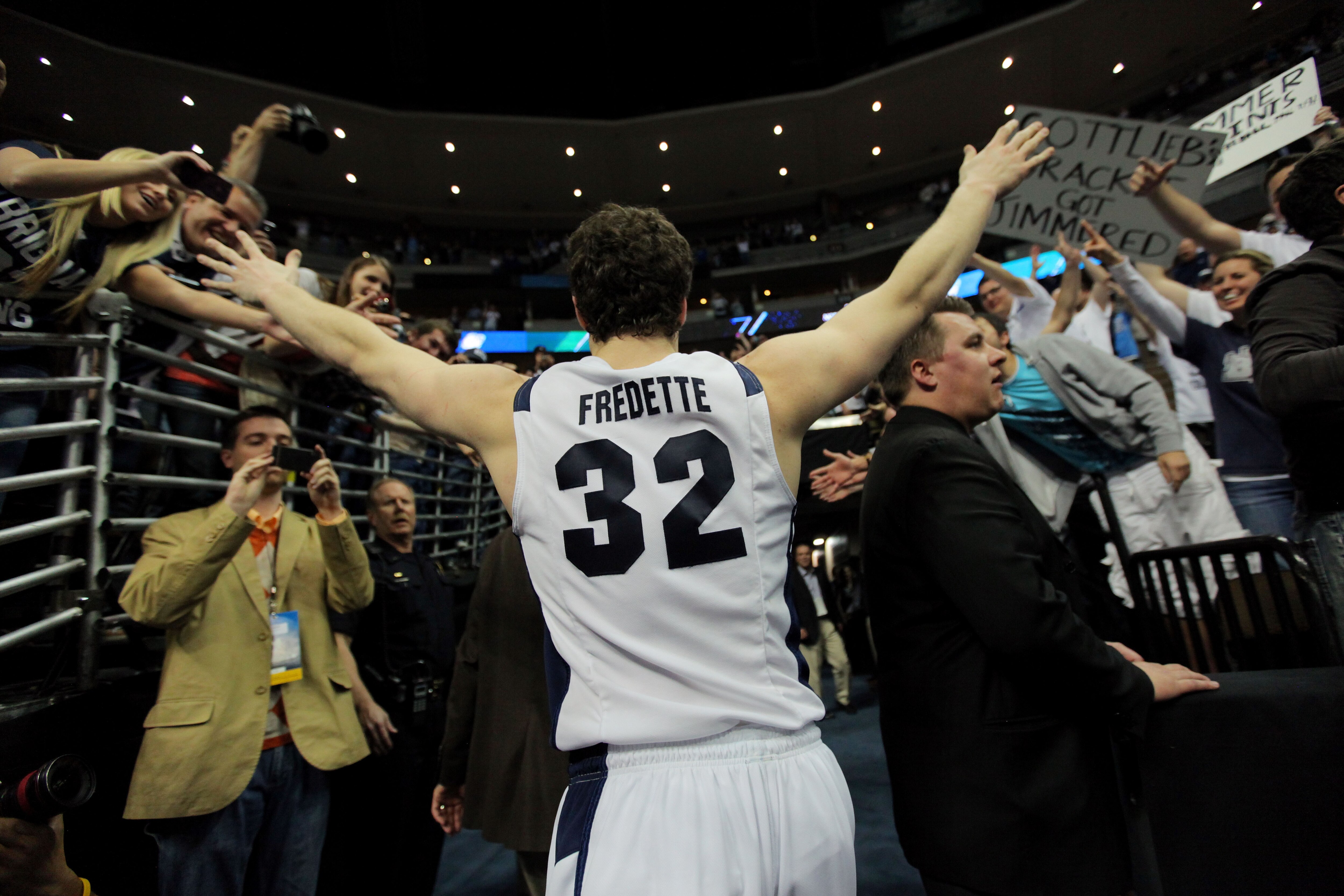 DENVER, CO - MARCH 19:  Jimmer Fredette #32 of the Brigham Young Cougars runs off of the court after defeating the Gonzaga Bulldogs during the third round of the 2011 NCAA men's basketball tournament at Pepsi Center on March 19, 2011 in Denver, Colorado.