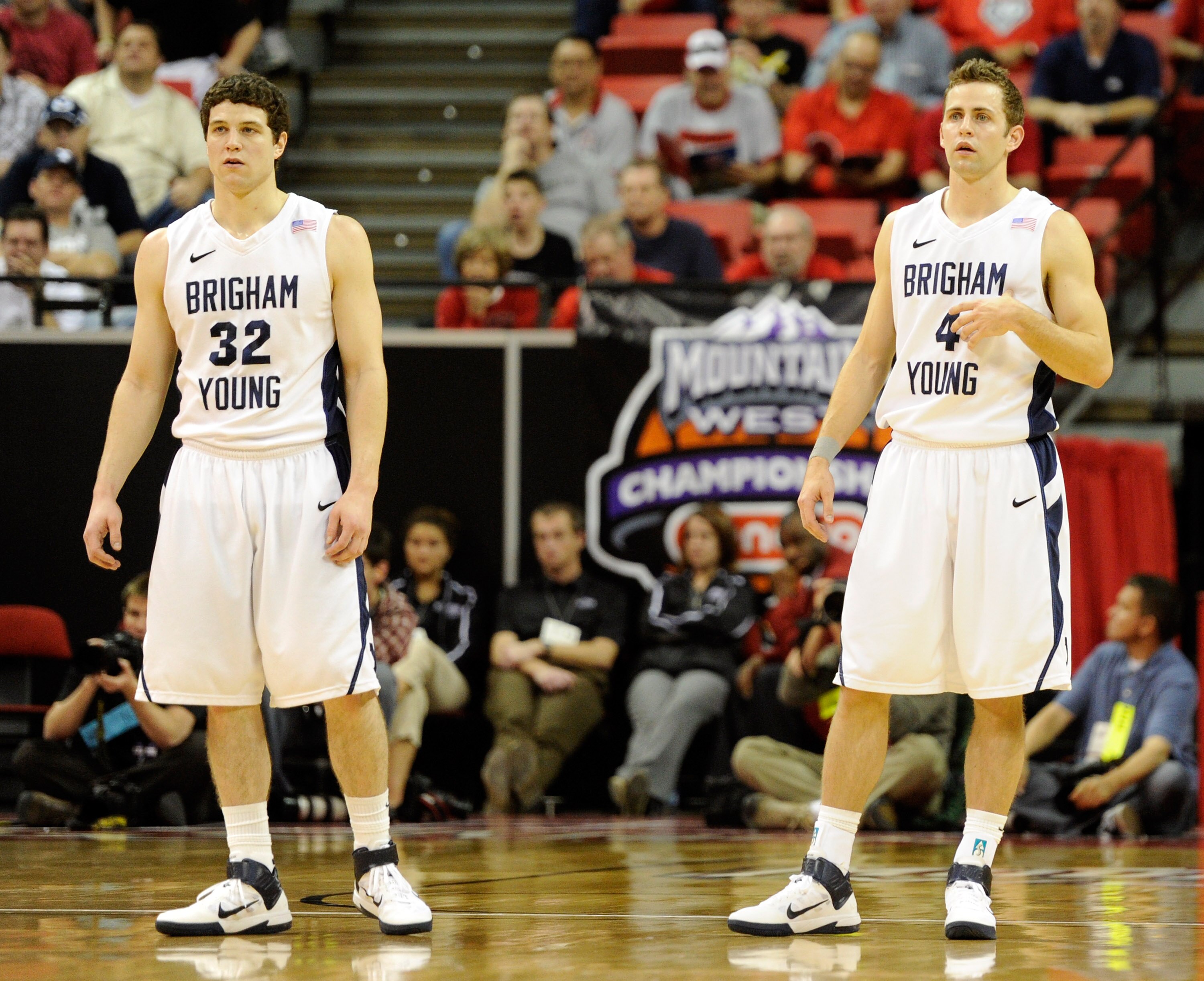 LAS VEGAS, NV - MARCH 10:  Jimmer Fredette #32 and Jackson Emery #4 of the Brigham Young University Cougars appear on the court during a quarterfinal game of the Conoco Mountain West Conference Basketball tournament against the Texas Christian University