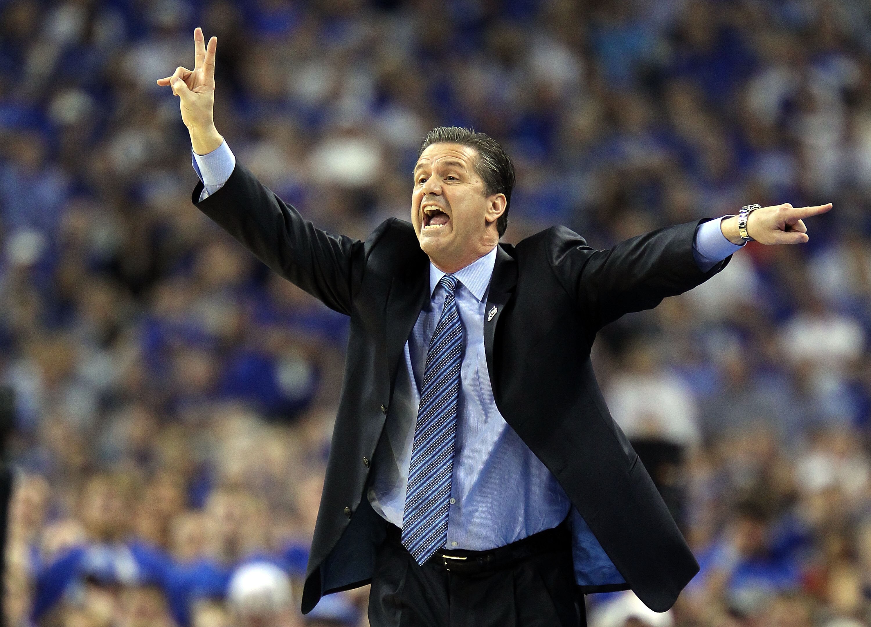 HOUSTON, TX - APRIL 02:  Head coach John Calipari of the Kentucky Wildcats shouts from the sidelines against the Connecticut Huskies during the National Semifinal game of the 2011 NCAA Division I Men's Basketball Championship at Reliant Stadium on April 2