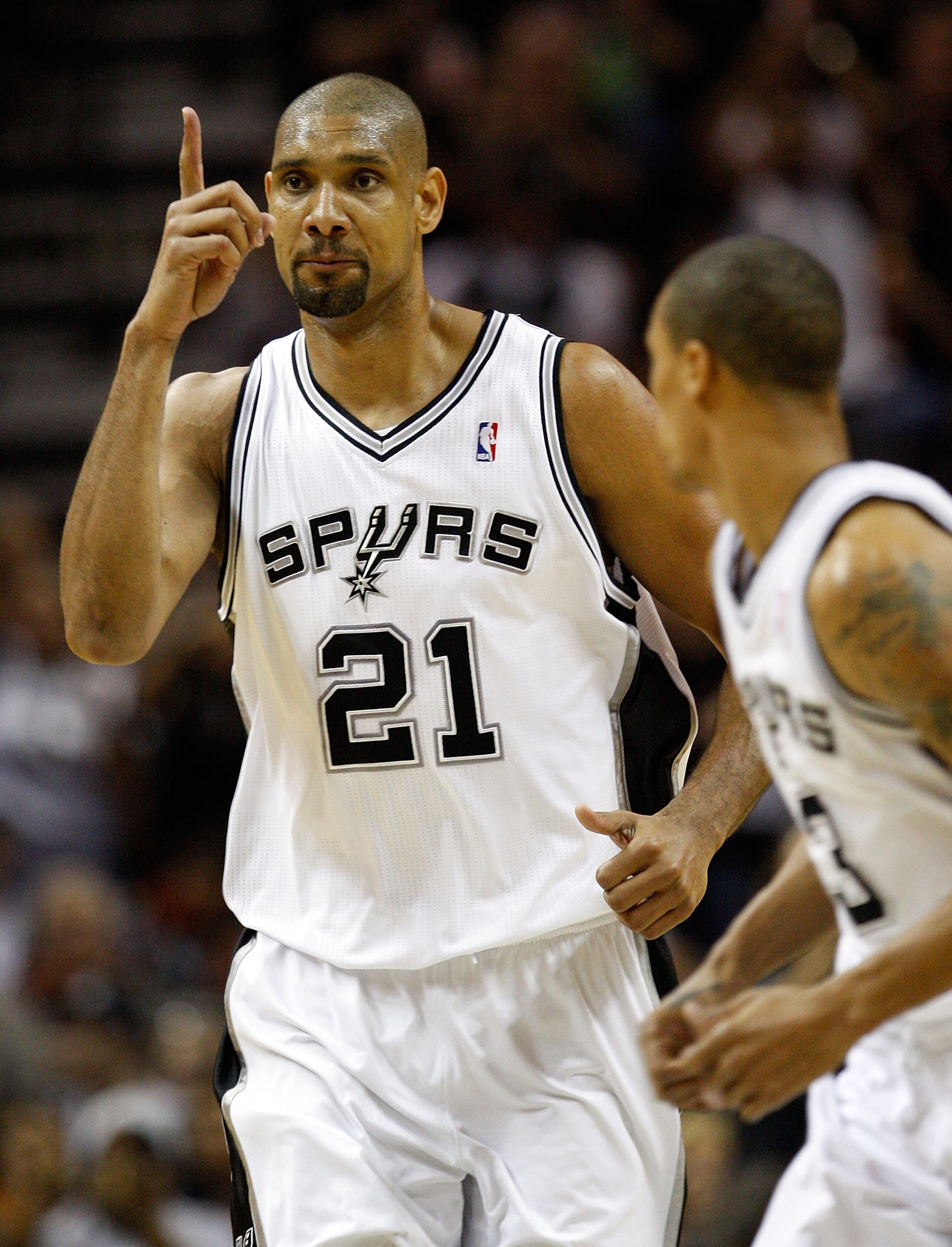 SAN ANTONIO, TX - APRIL 17:  Forward Tim Duncan #21 of the San Antonio Spurs reacts against the Memphis Grizzlies in Game One of the Western Conference Quarterfinals in the 2011 NBA Playoffs on April 17, 2011 at AT&T Center in San Antonio, Texas.  NOTE TO