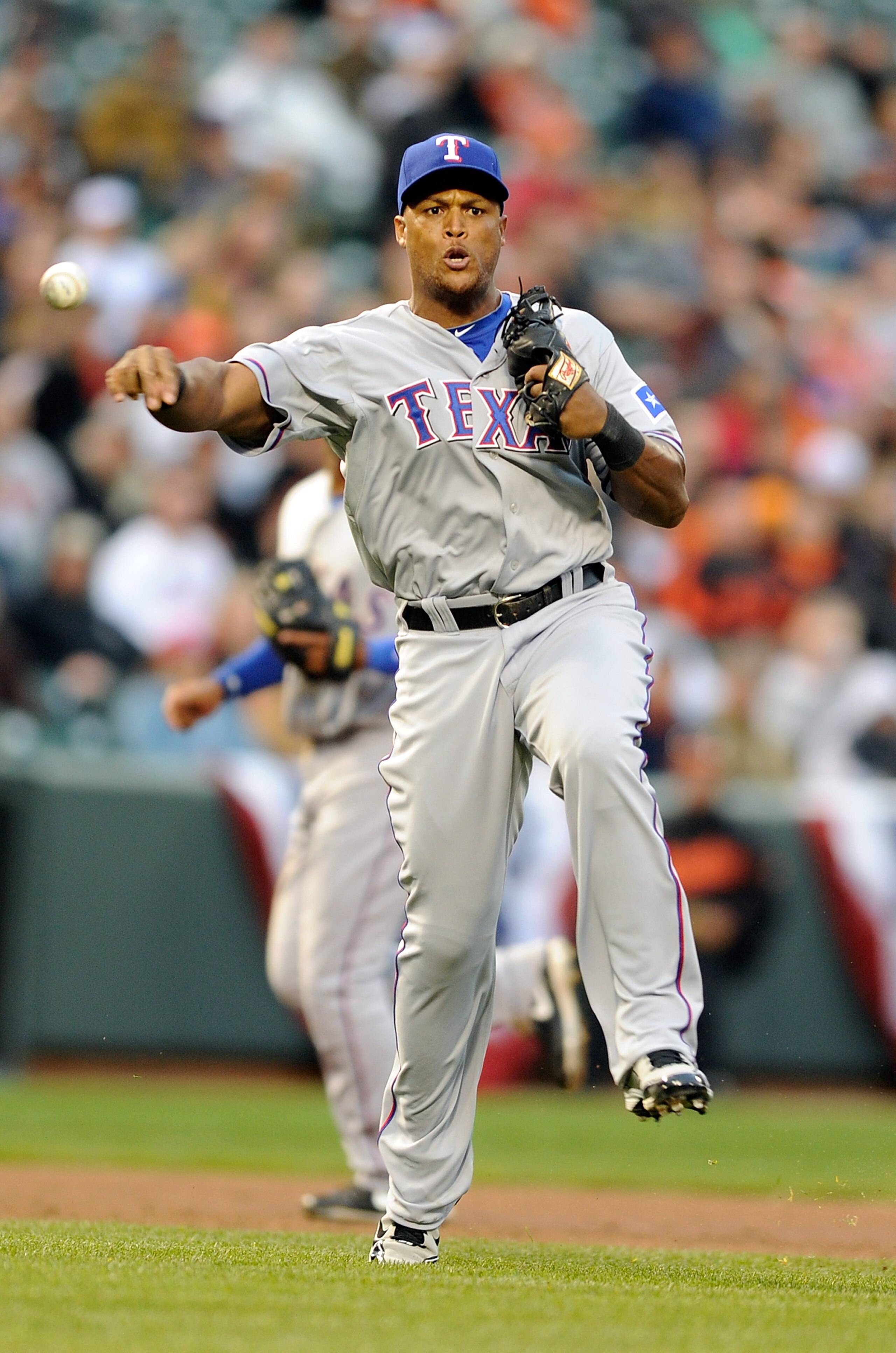 BALTIMORE, MD - APRIL 09:  Adrian Beltre #29 of the Texas Rangers throws the ball to first base against the Baltimore Orioles at Oriole Park at Camden Yards on April 9, 2011 in Baltimore, Maryland.  (Photo by Greg Fiume/Getty Images)