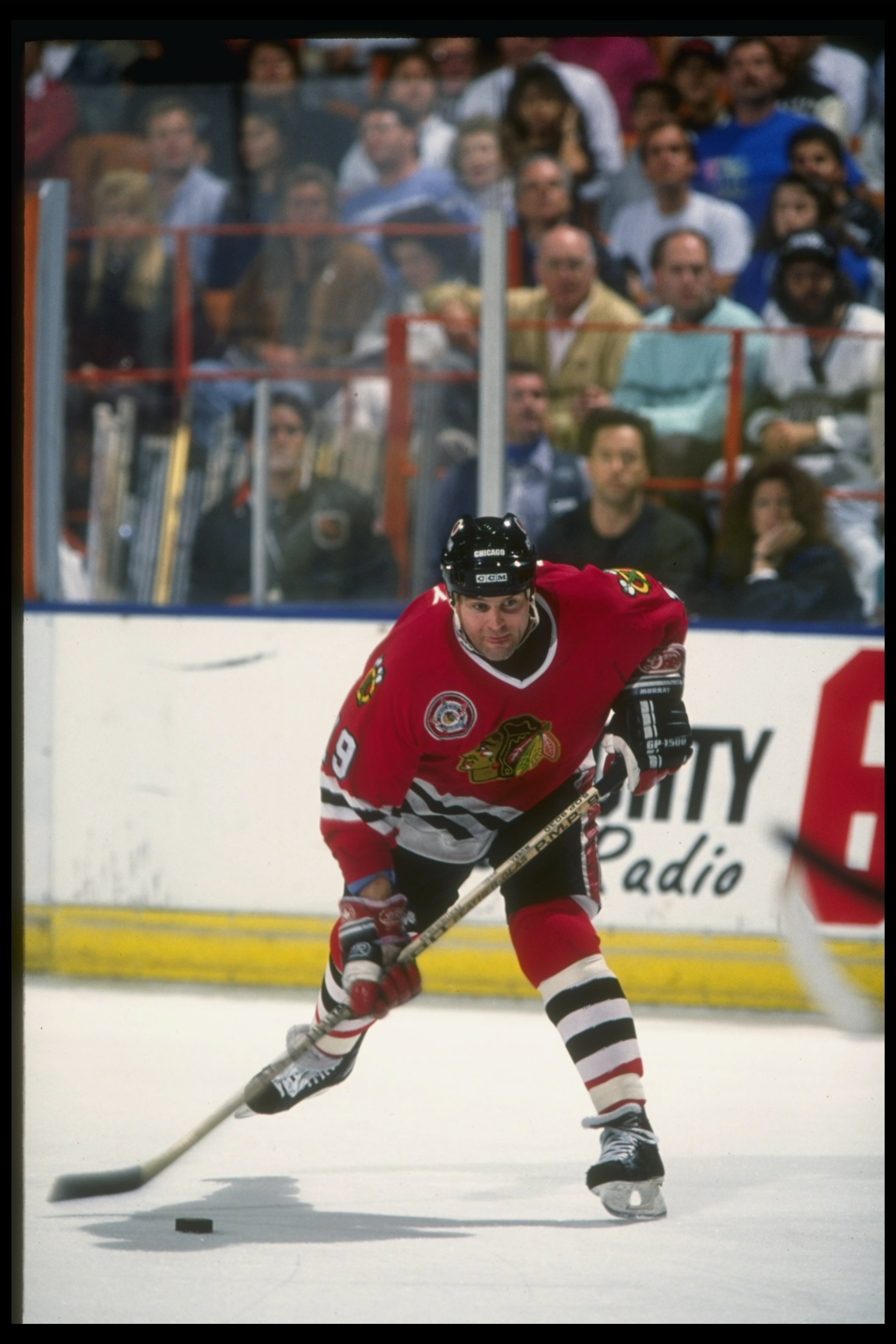1990-1991:  Center Troy Murray of the Chicago Blackhawks moves the puck during a game against the Los Angeles Kings at the Great Western Forum in Inglewood, California. Mandatory Credit: Mike Powell  /Allsport