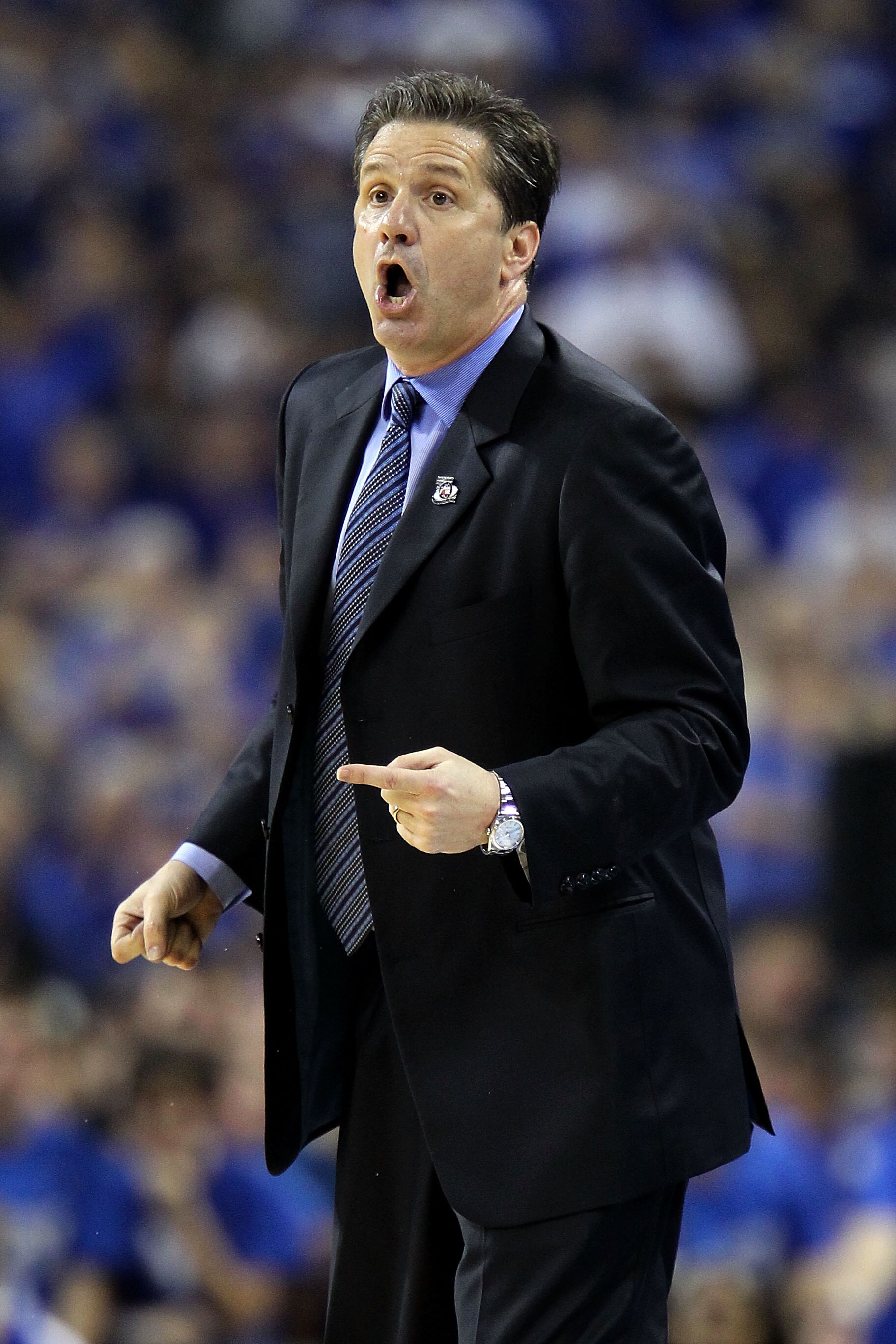 HOUSTON, TX - APRIL 02:  Head coach John Calipari of the Kentucky Wildcats reacts from the sidelines against the Connecticut Huskies during the National Semifinal game of the 2011 NCAA Division I Men's Basketball Championship at Reliant Stadium on April 2