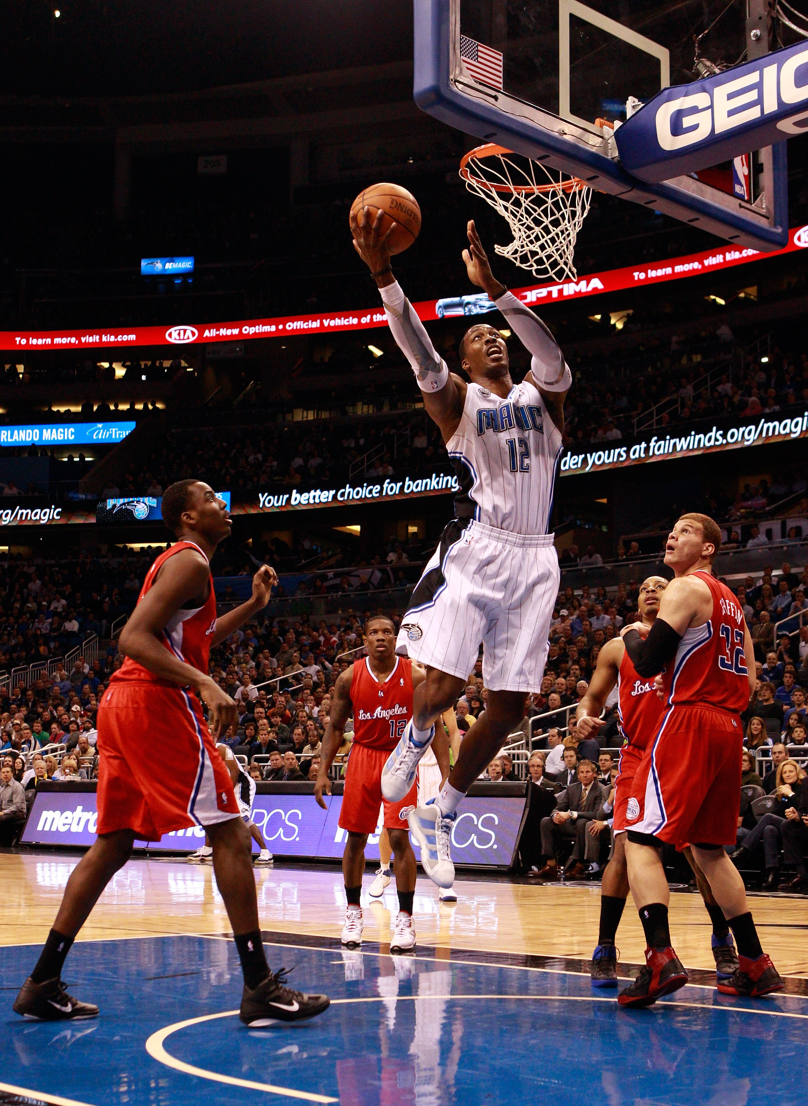 ORLANDO, FL - FEBRUARY 08: Dwight Howard #12 of the Orlando Magic attempts a shot during a game against the Los Angeles Clippers at Amway Arena on February 8, 2011 in Orlando, Florida. NOTE TO USER: User expressly acknowledges and agrees that, by downlo ORLANDO, FL - FEBRUARY 08: Dwight Howard #12 of the Orlando Magic attempts a shot during a game against the Los Angeles Clippers at Amway Arena on February 8, 2011 in Orlando, Florida. NOTE TO USER: User expressly acknowledges and agrees that, by downlo