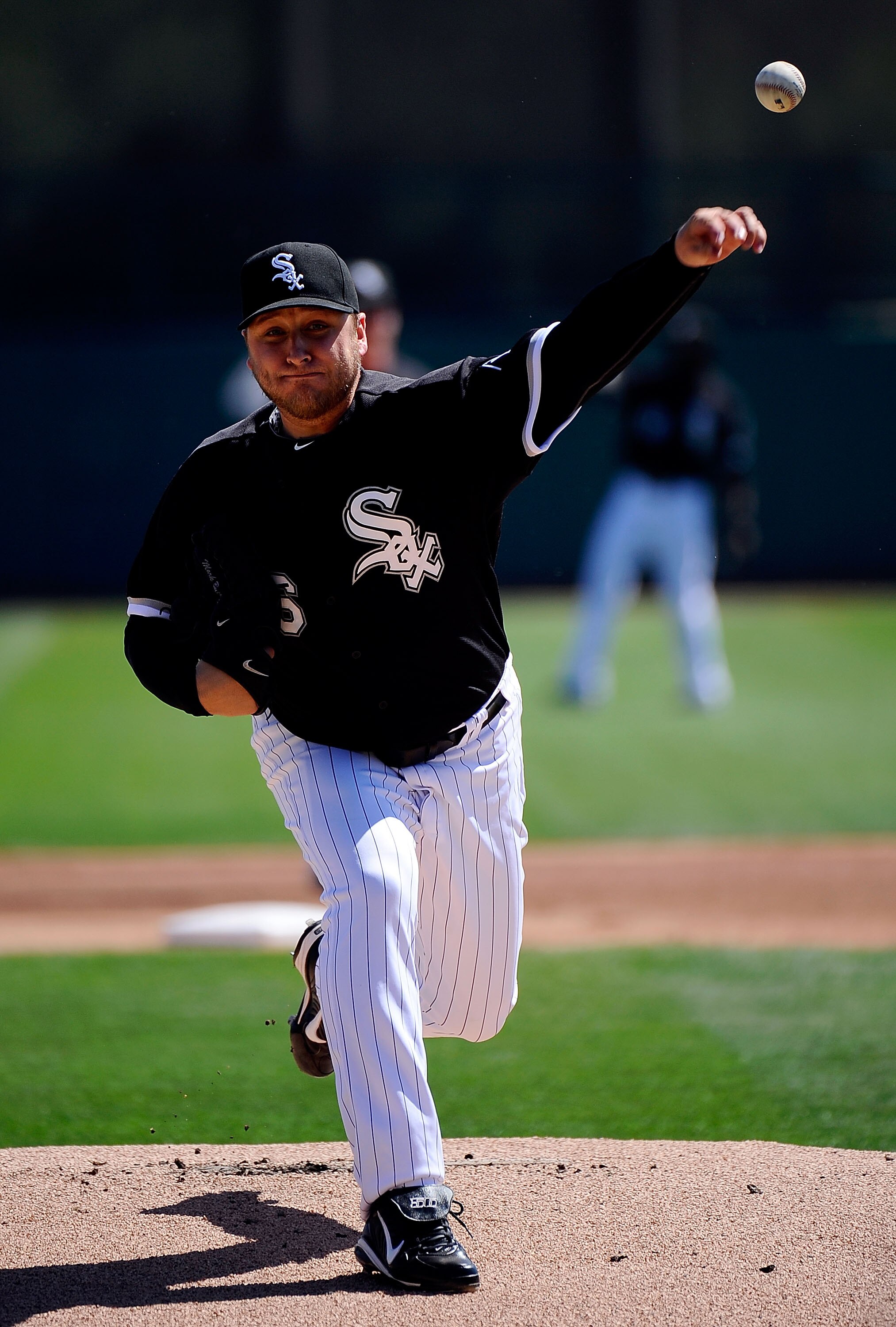 GLENDALE, AZ - MARCH 11:  Mark Buehrle #56 of the Chicago White Sox pitches during the spring training baseball game against Chicago Cubs at Camelback Ranch on March 11, 2011 in Glendale, Arizona.  (Photo by Kevork Djansezian/Getty Images)