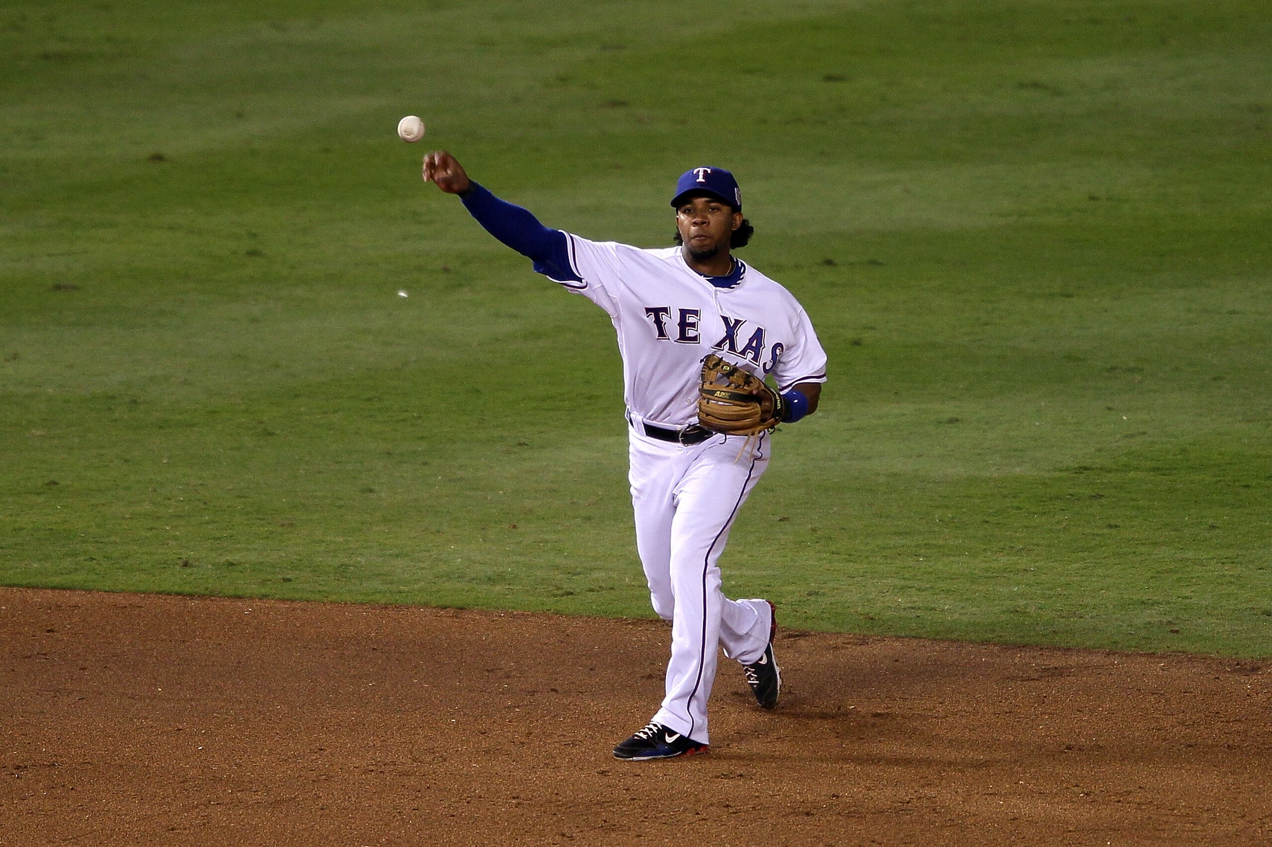 ARLINGTON, TX - NOVEMBER 01: Elvis Andrus #1 of the Texas Rangers throws the ball to first base against the San Francisco Giants in Game Five of the 2010 MLB World Series at Rangers Ballpark in Arlington on November 1, 2010 in Arlington, Texas. (Photo b ARLINGTON, TX - NOVEMBER 01: Elvis Andrus #1 of the Texas Rangers throws the ball to first base against the San Francisco Giants in Game Five of the 2010 MLB World Series at Rangers Ballpark in Arlington on November 1, 2010 in Arlington, Texas. (Photo b