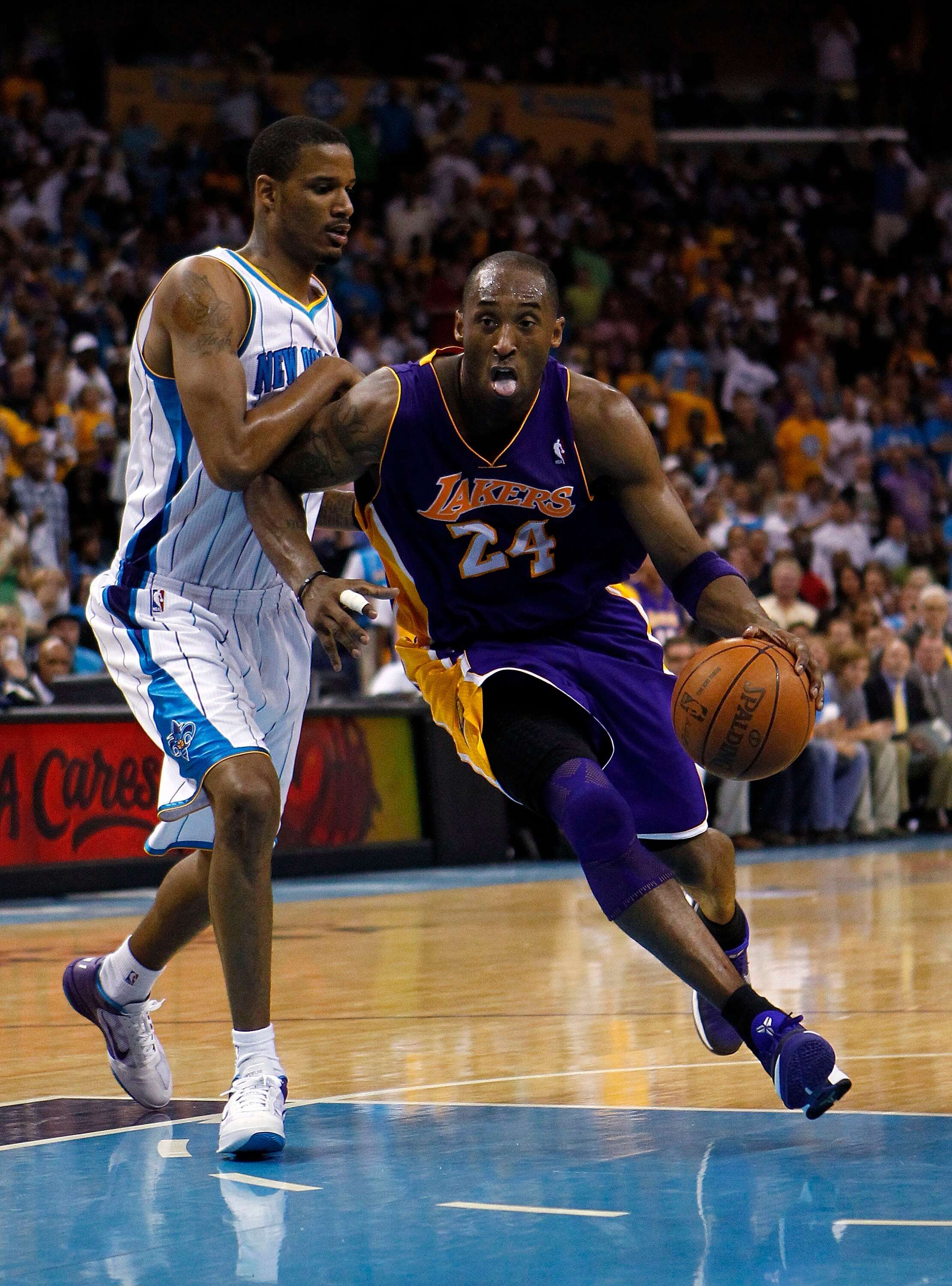 NEW ORLEANS, LA - APRIL 24: Trevor Ariza #1 of the New Orleans Hornets guards Kobe Bryant #24 of the Los Angeles Lakers in Game Four of the Western Conference Quarterfinals in the 2011 NBA Playoffs at New Orleans Arena on April 24, 2011 in New Orleans, Lo
