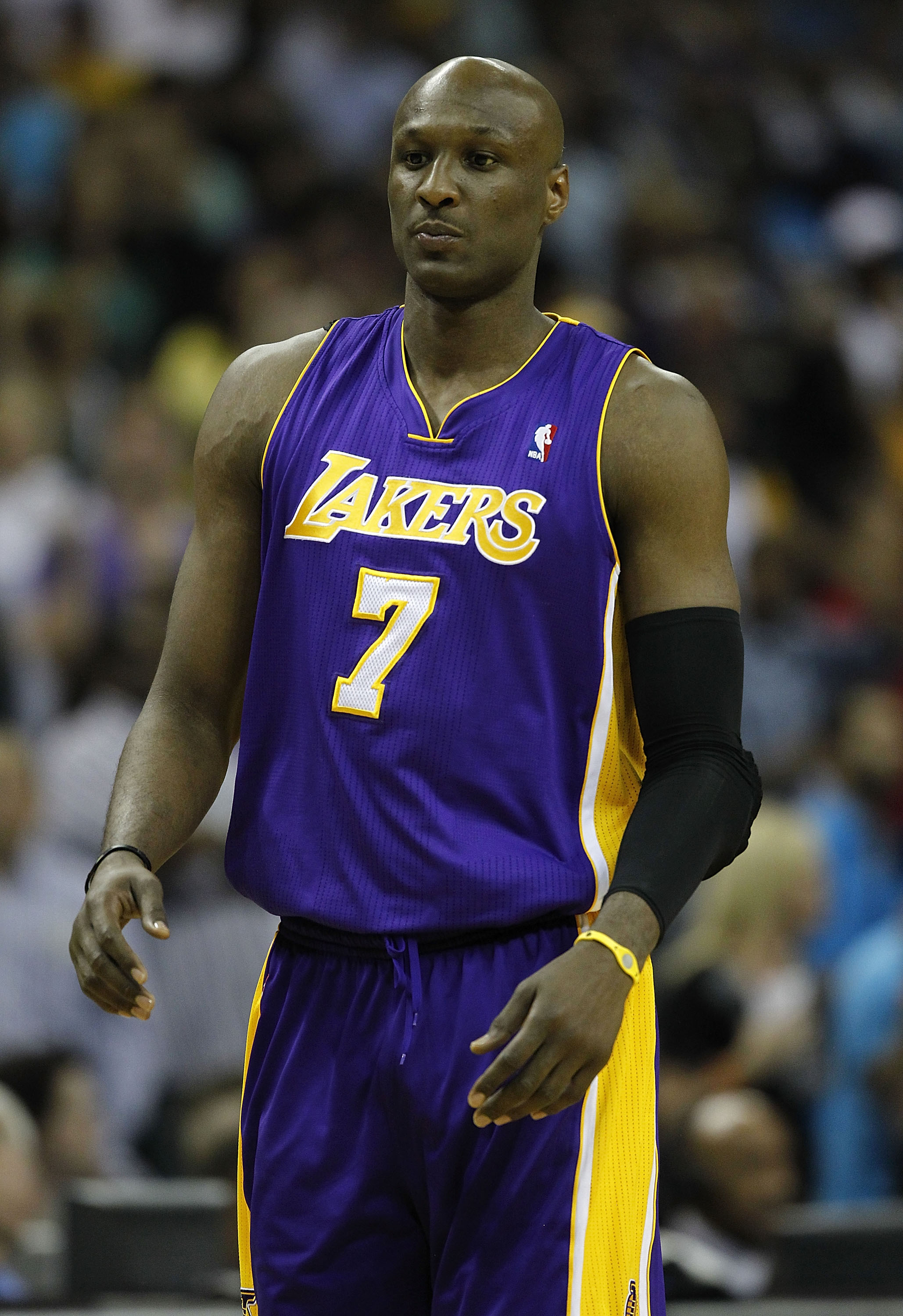 NEW ORLEANS, LA - APRIL 24:  Lamar Odom #7 of the Los Angeles Lakers stands during a freethrow against the New Orleans Hornets in Game Four of the Western Conference Quarterfinals in the 2011 NBA Playoffs at New Orleans Arena on April 24, 2011 in New Orle