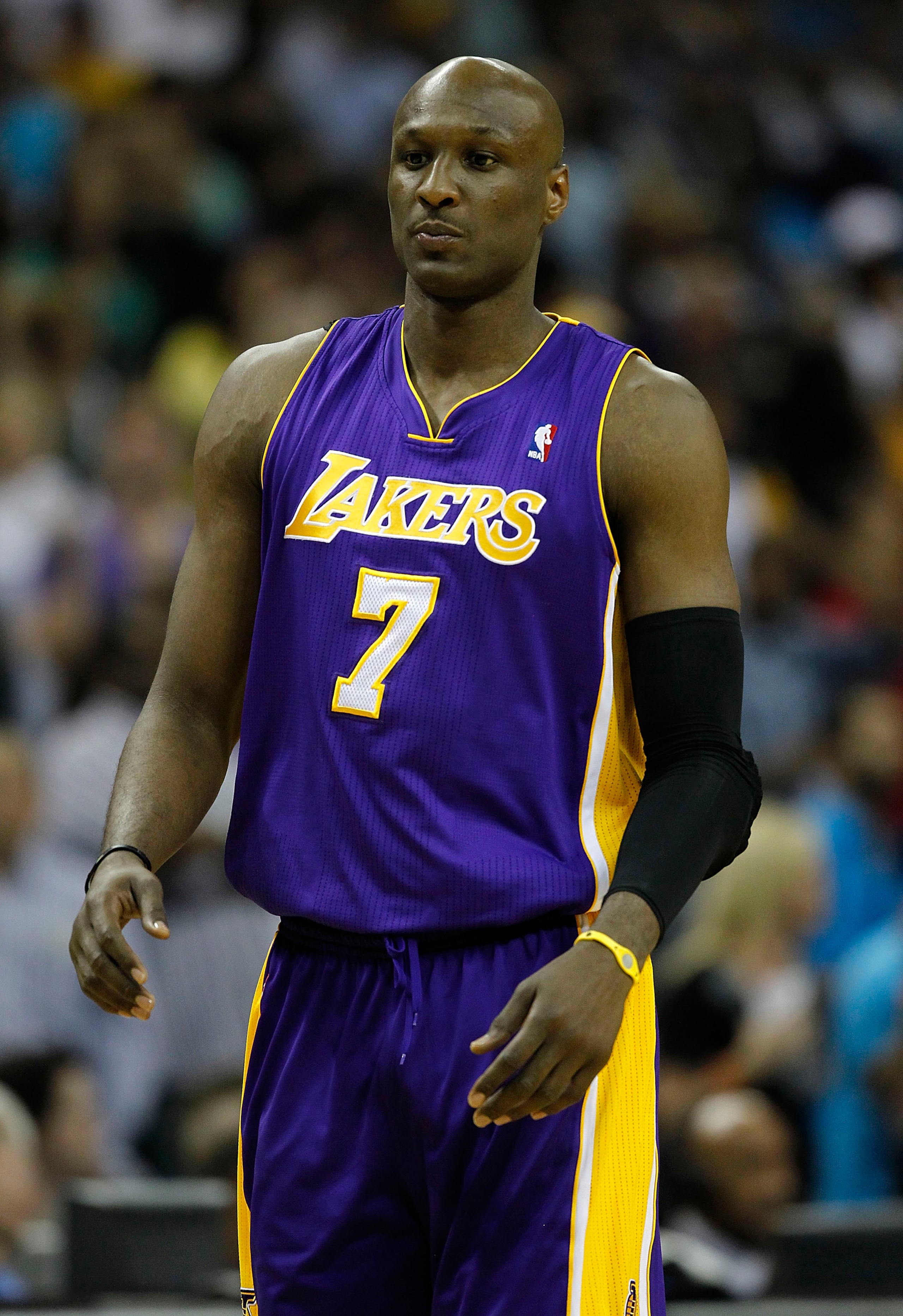 NEW ORLEANS, LA - APRIL 24:  Lamar Odom #7 of the Los Angeles Lakers stands during a freethrow against the New Orleans Hornets in Game Four of the Western Conference Quarterfinals in the 2011 NBA Playoffs at New Orleans Arena on April 24, 2011 in New Orle