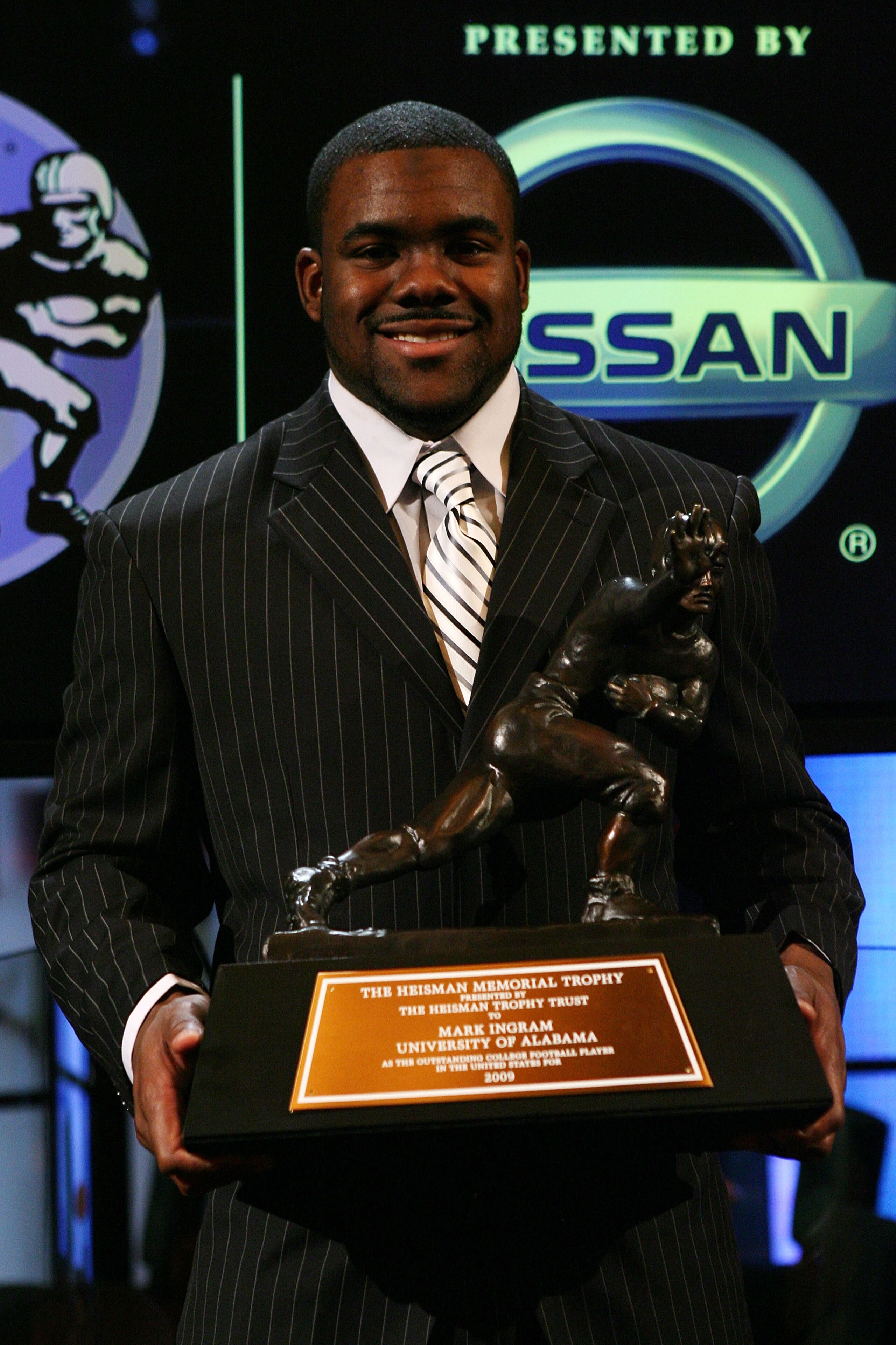 NEW YORK - DECEMBER 12:  Running back Mark Ingram #22 of the Alabama Crimson Tide poses with the Heisman Trophy during a press conference after being named the 75th Heisman Trophy winner at the Marriott Marquis on December 12, 2009 in New York City.  (Pho