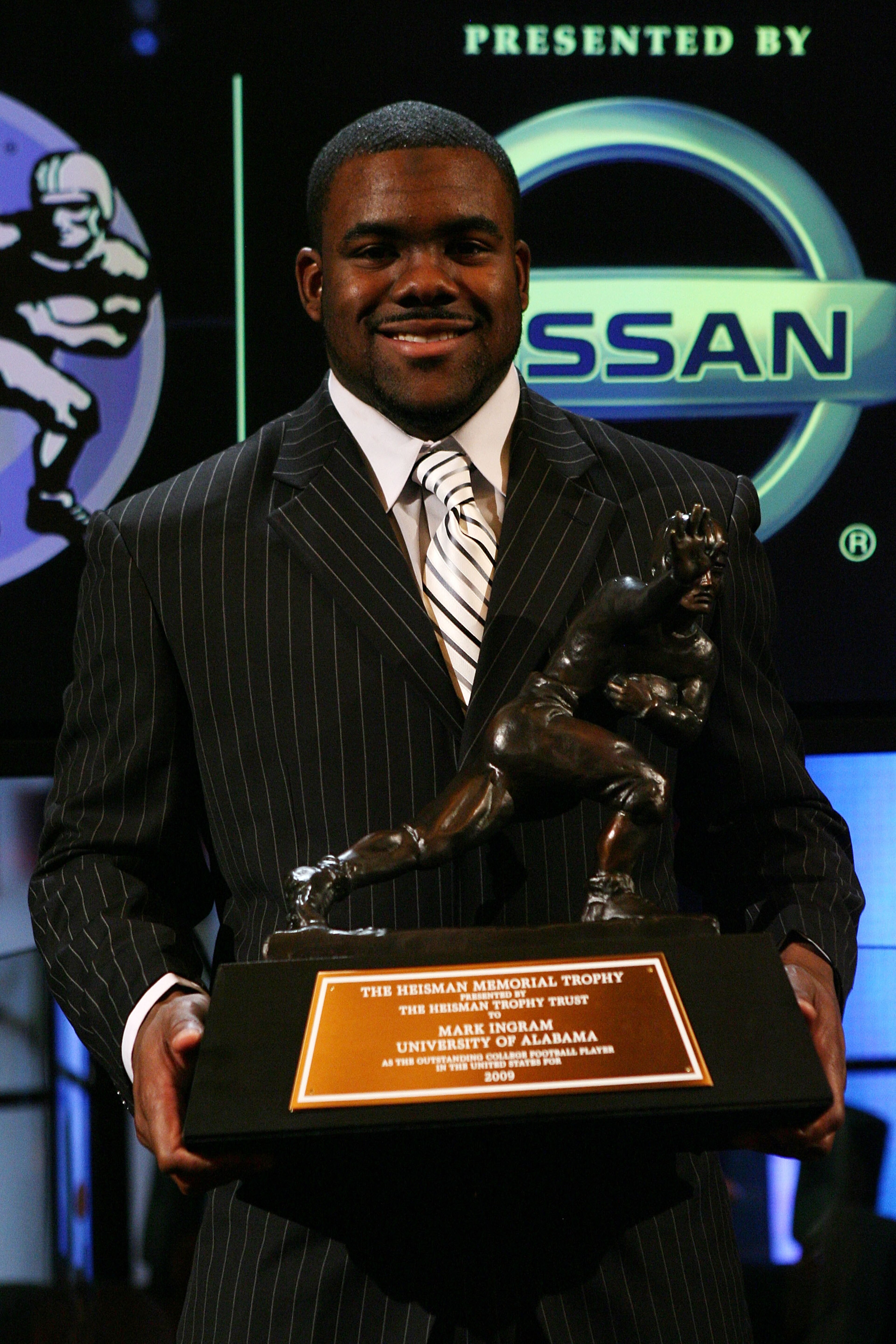 NEW YORK - DECEMBER 12:  Running back Mark Ingram #22 of the Alabama Crimson Tide poses with the Heisman Trophy during a press conference after being named the 75th Heisman Trophy winner at the Marriott Marquis on December 12, 2009 in New York City.  (Pho
