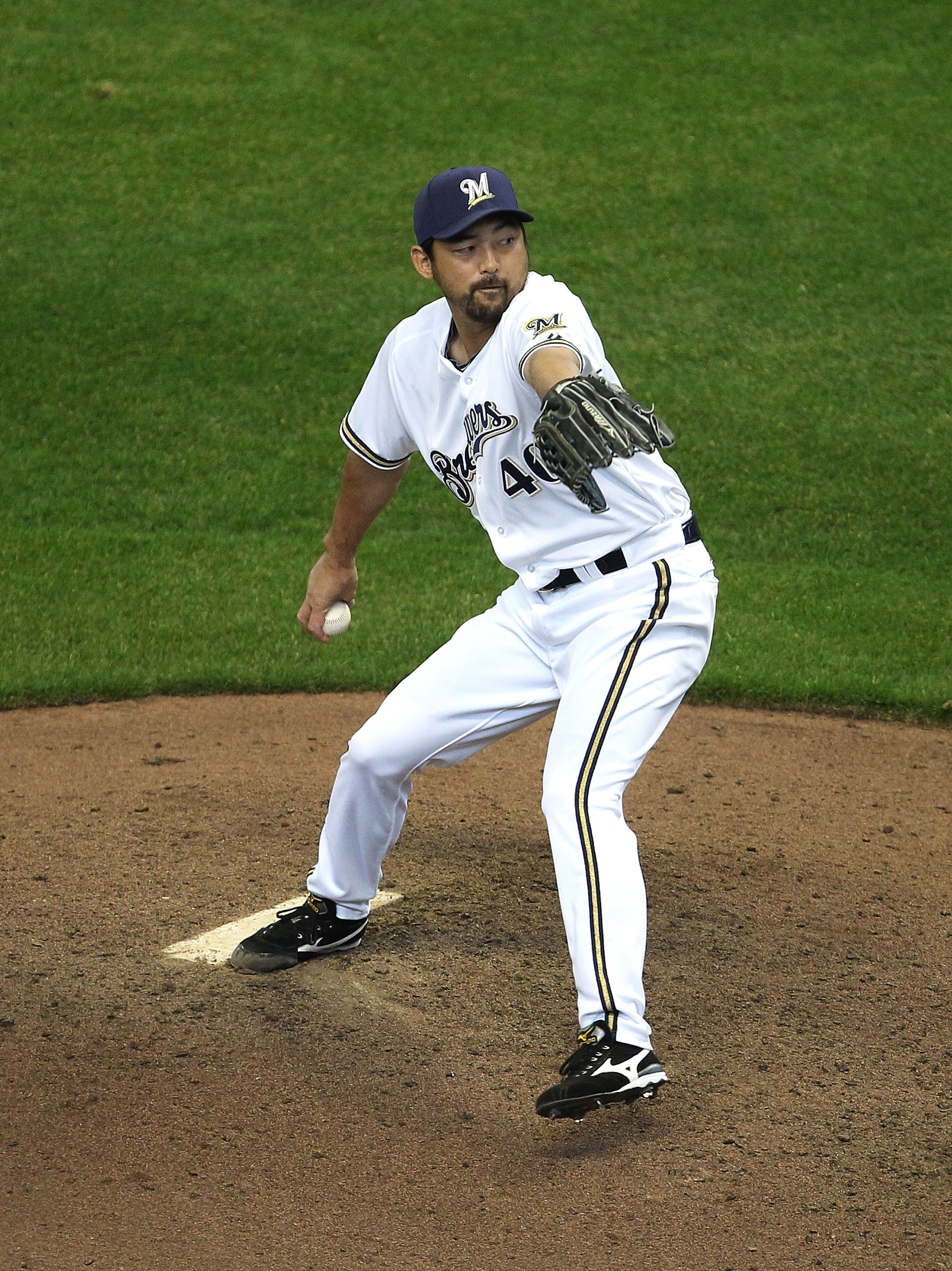 MILWAUKEE, WI - APRIL 04: Takashi Saito #40 of the Milwaukee Brewers gave up two solo home runs in the 8th inning to the Atlanta Braves during the home opener at Miller Park on April 4, 2011 in Milwaukee, Wisconsin. The Braves defeated the Brewers 2-1. (P