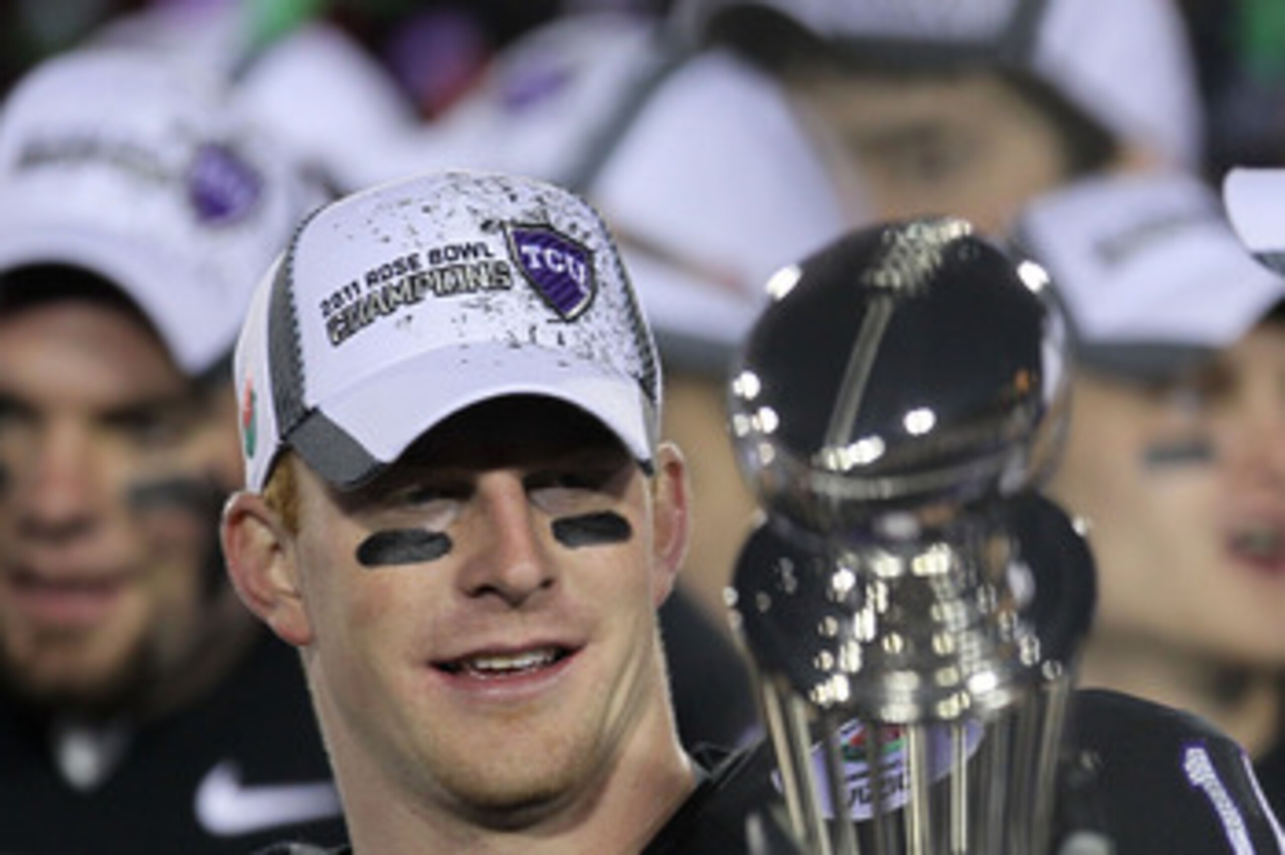PASADENA, CA - JANUARY 01:  Quarterback Andy Dalton #14 of the TCU Horned Frogs looks to pass against the Wisconsin Badgers in the 97th Rose Bowl game on January 1, 2011 in Pasadena, California.  (Photo by Jeff Gross/Getty Images)