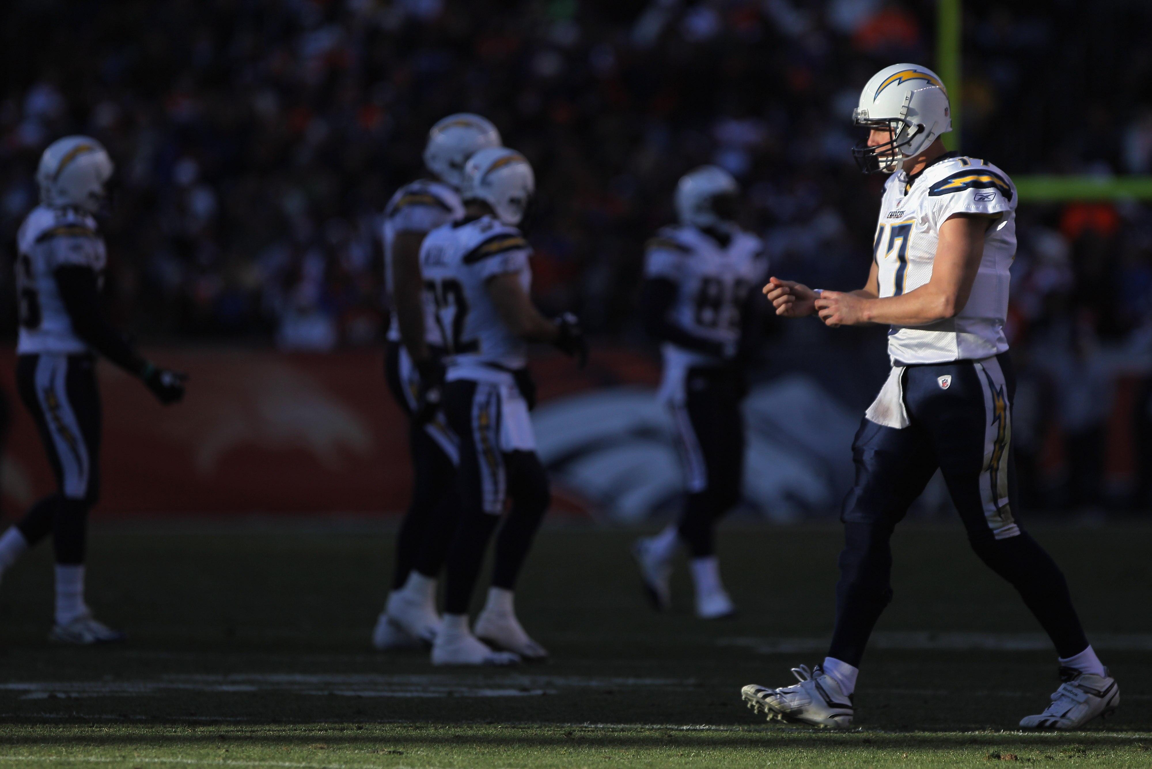 DENVER - JANUARY 02:  Quarterback Philip Rivers #17 of the San Diego Chargers takes the field against the Denver Broncos at INVESCO Field at Mile High on January 2, 2011 in Denver, Colorado. The Chargers defeated the Broncos 33-28.  (Photo by Doug Pensing