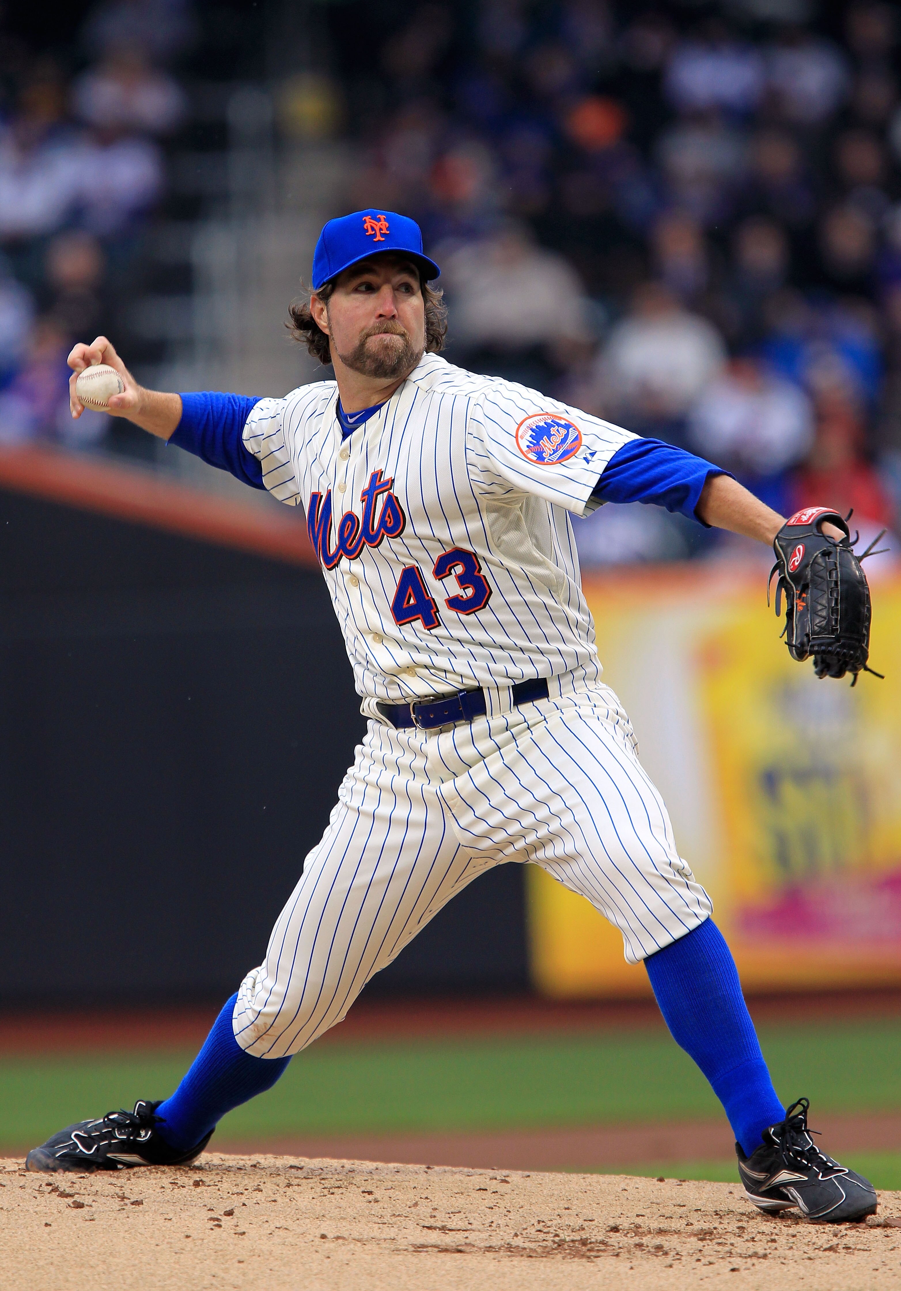 NEW YORK, NY - APRIL 08:  Starting pitcher R.A. Dickey #43 of the New York Mets throws a pitch against the Washington Nationals during the Mets' Home Opener at Citi Field on April 8, 2011 in the Flushing neighborhood of Queens in New York City. The Nation