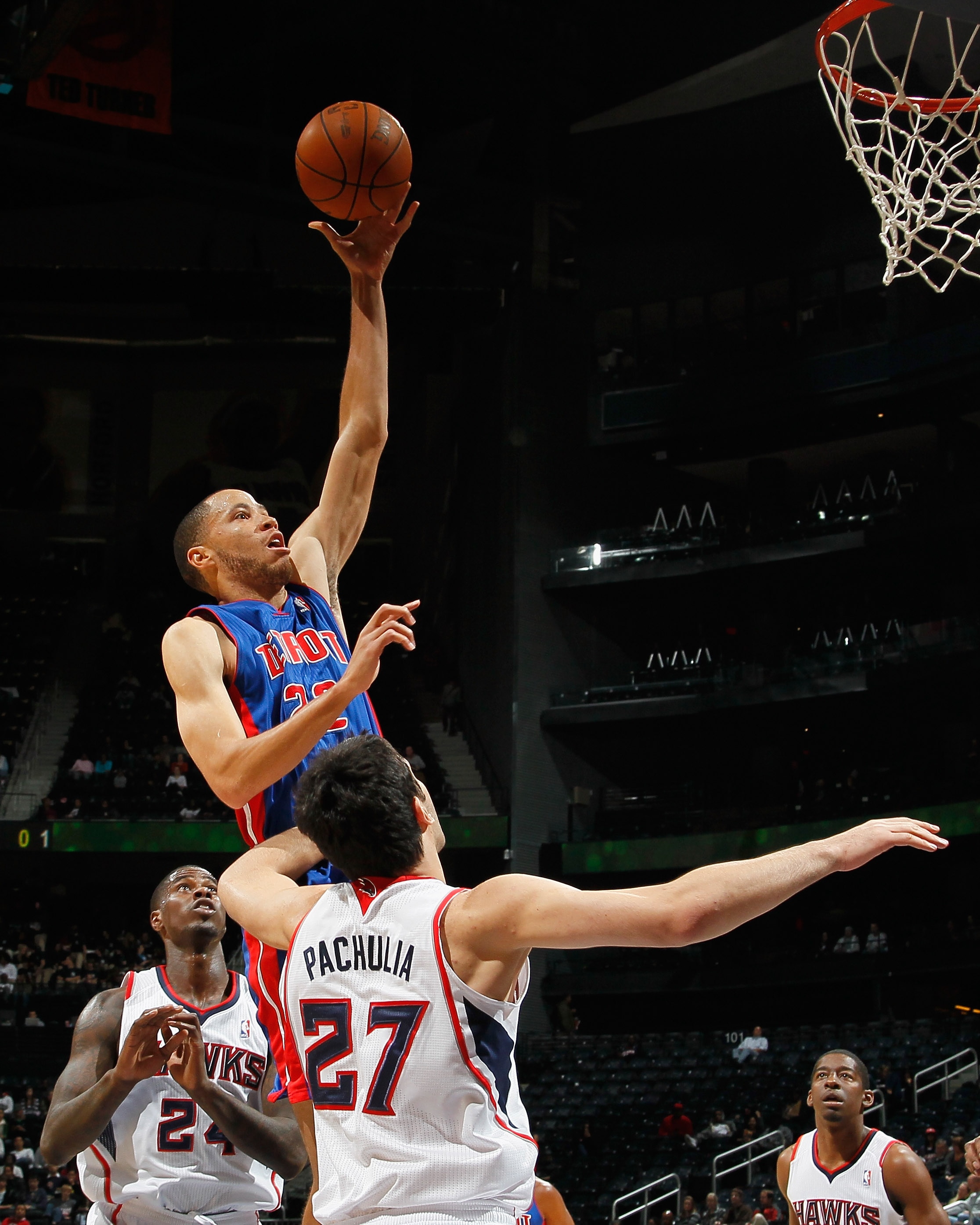 ATLANTA - NOVEMBER 03:  Tayshaun Prince #22 of the Detroit Pistons against Zaza Pachulia #27 of the Atlanta Hawks at Philips Arena on November 3, 2010 in Atlanta, Georgia.  NOTE TO USER: User expressly acknowledges and agrees that, by downloading and/or u