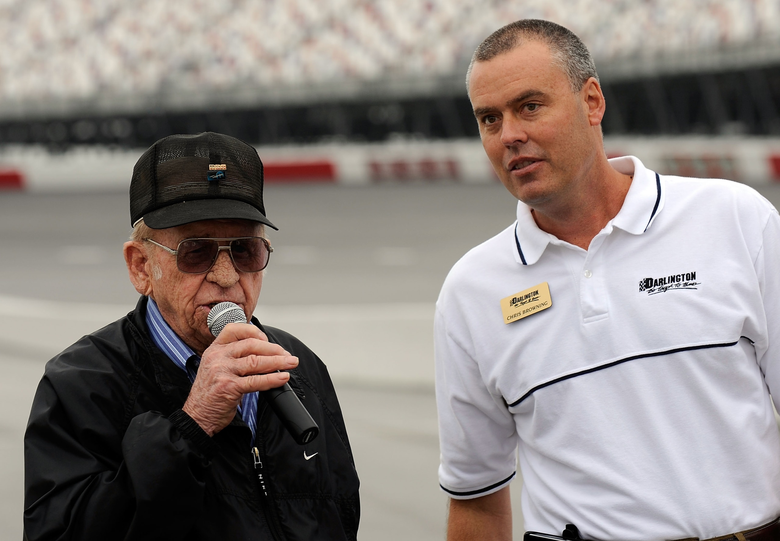 DARLINGTON, SC - SEPTEMBER 26:  NASCAR legend Cotton Owens gives the command to fire engines with Darlington Raceway president Chris Browning to officially open the Darlington Historic Racing Festival on September 26, 2009 at Darlington Raceway in Darling